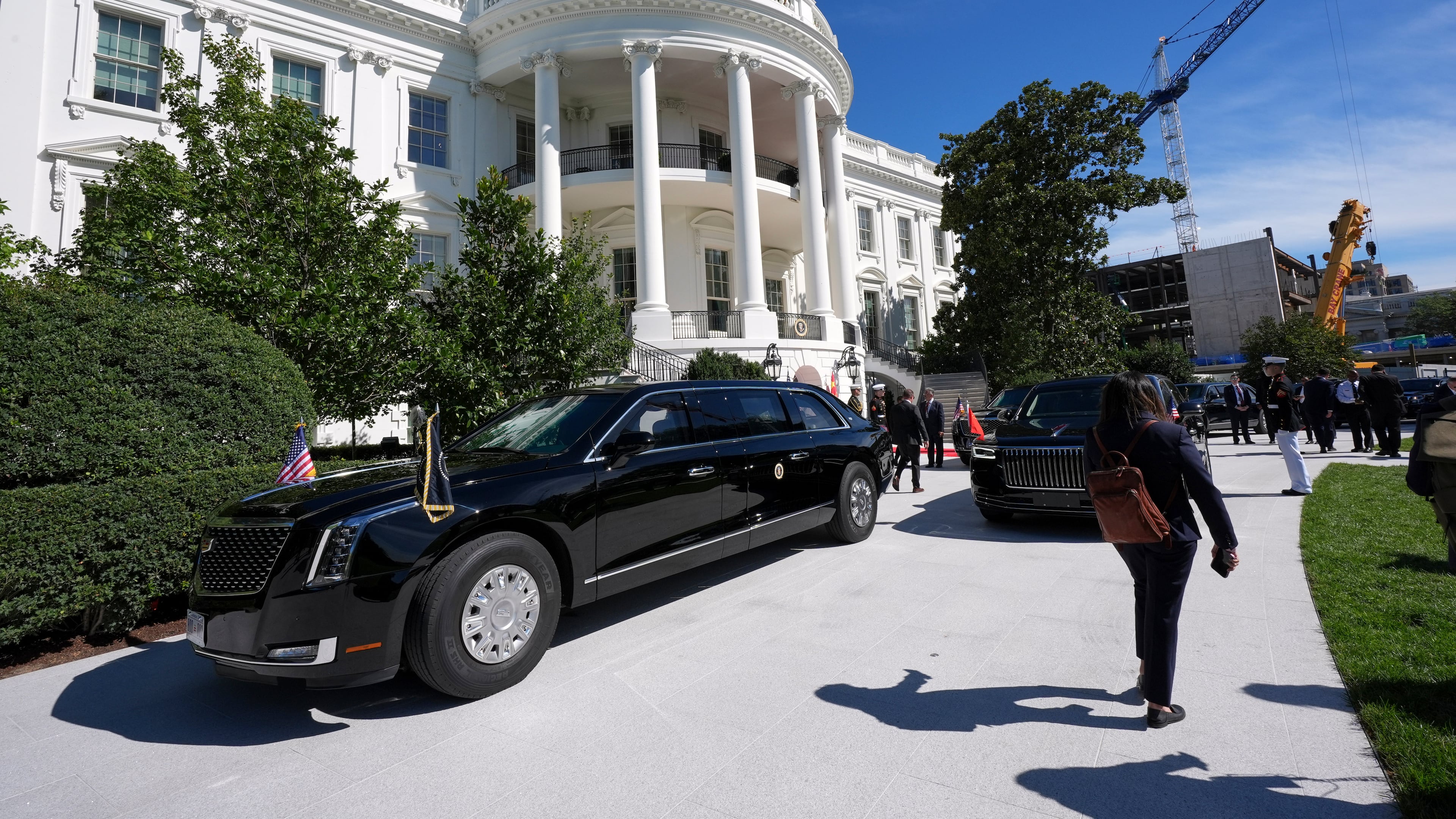 The motorcade of President Donald Trump departs the White House en route to the National Archives to greet China's President Xi Jinping and his wife Peng Liyuan, Friday, Sept. 25, 2026, in Washington. (AP Photo/Jacquelyn Martin)