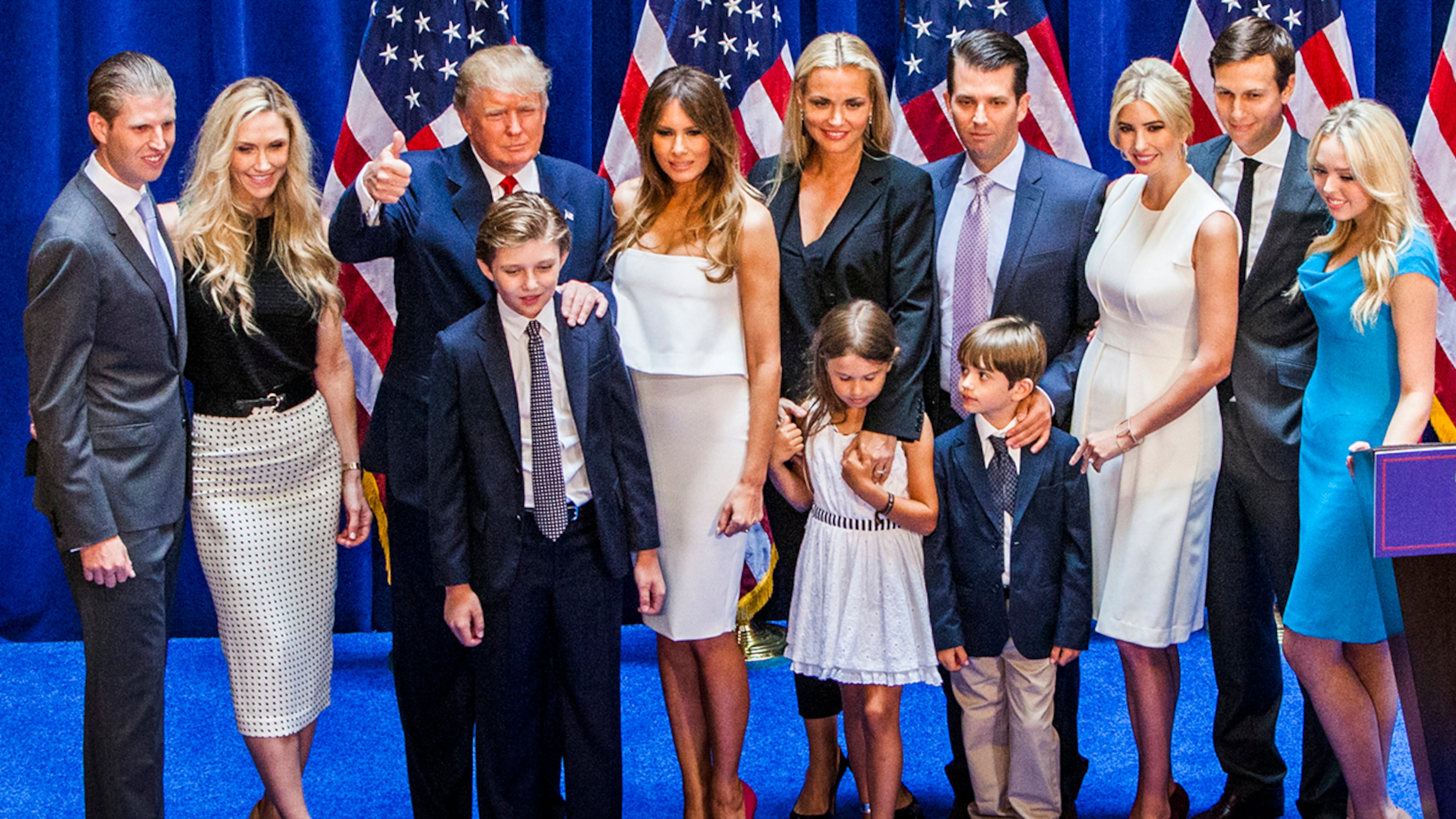 NEW YORK, NY - JUNE 16: (L-R) Eric Trump, Lara Yunaska Trump, Donald Trump, Barron Trump, Melania Trump, Vanessa Haydon Trump, Kai Madison Trump, Donald Trump Jr., Donald John Trump III, Ivanka Trump, Jared Kushner, and Tiffany Trump pose for photos on stage after Donald Trump announced his candidacy for the U.S. presidency at Trump Tower on June 16, 2015 in New York City. Trump is the 12th Republican who has announced running for the White House. (Photo by Christopher Gregory/Getty Images)
