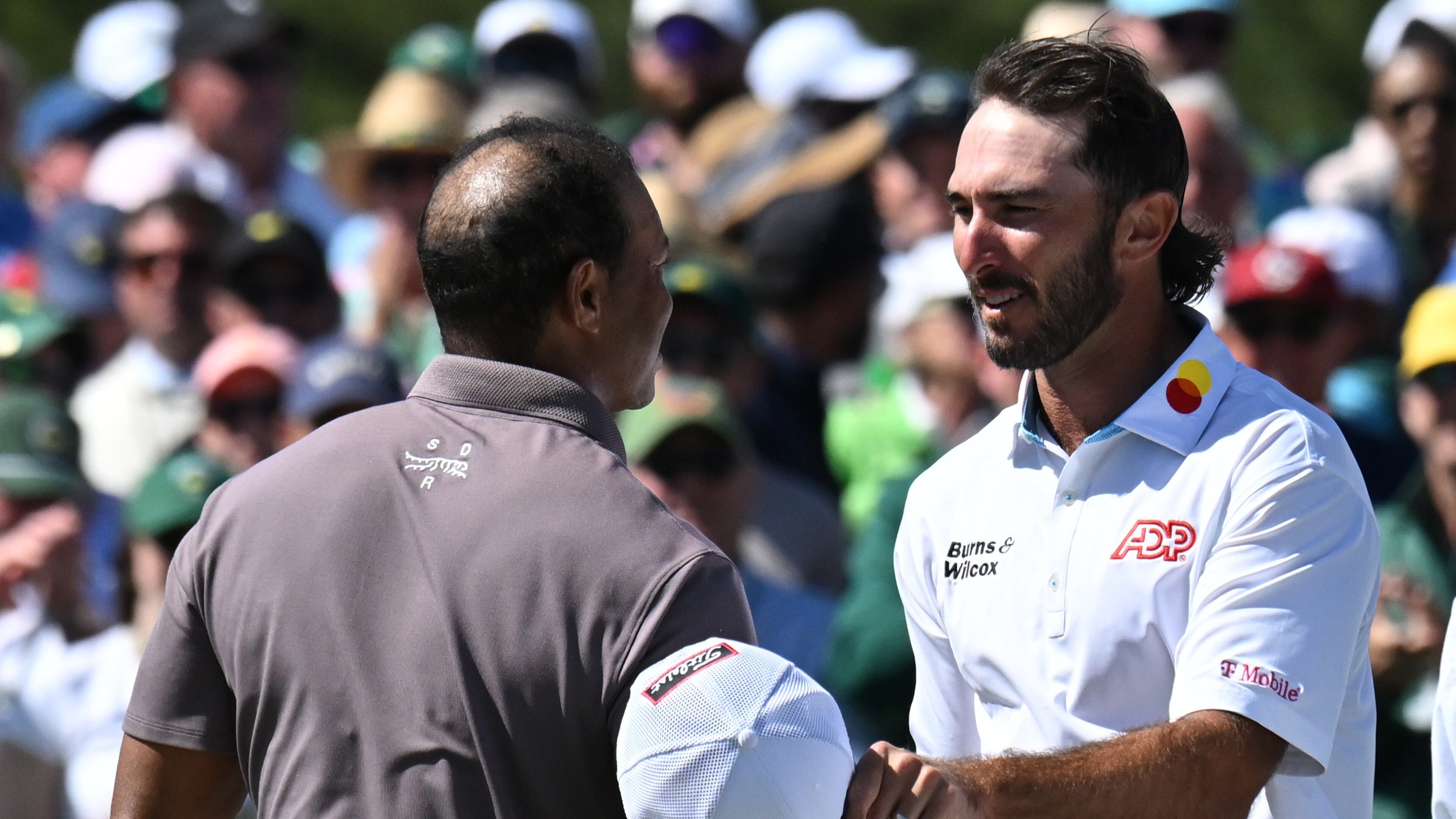Max Homa (right) and Tiger Woods shake hands at the end of the second round of the 2024 Masters Tournament at Augusta National Golf Club, Friday, April 12, 2024, in Augusta, Ga. (Hyosub Shin / Hyosub.Shin@ajc.com)