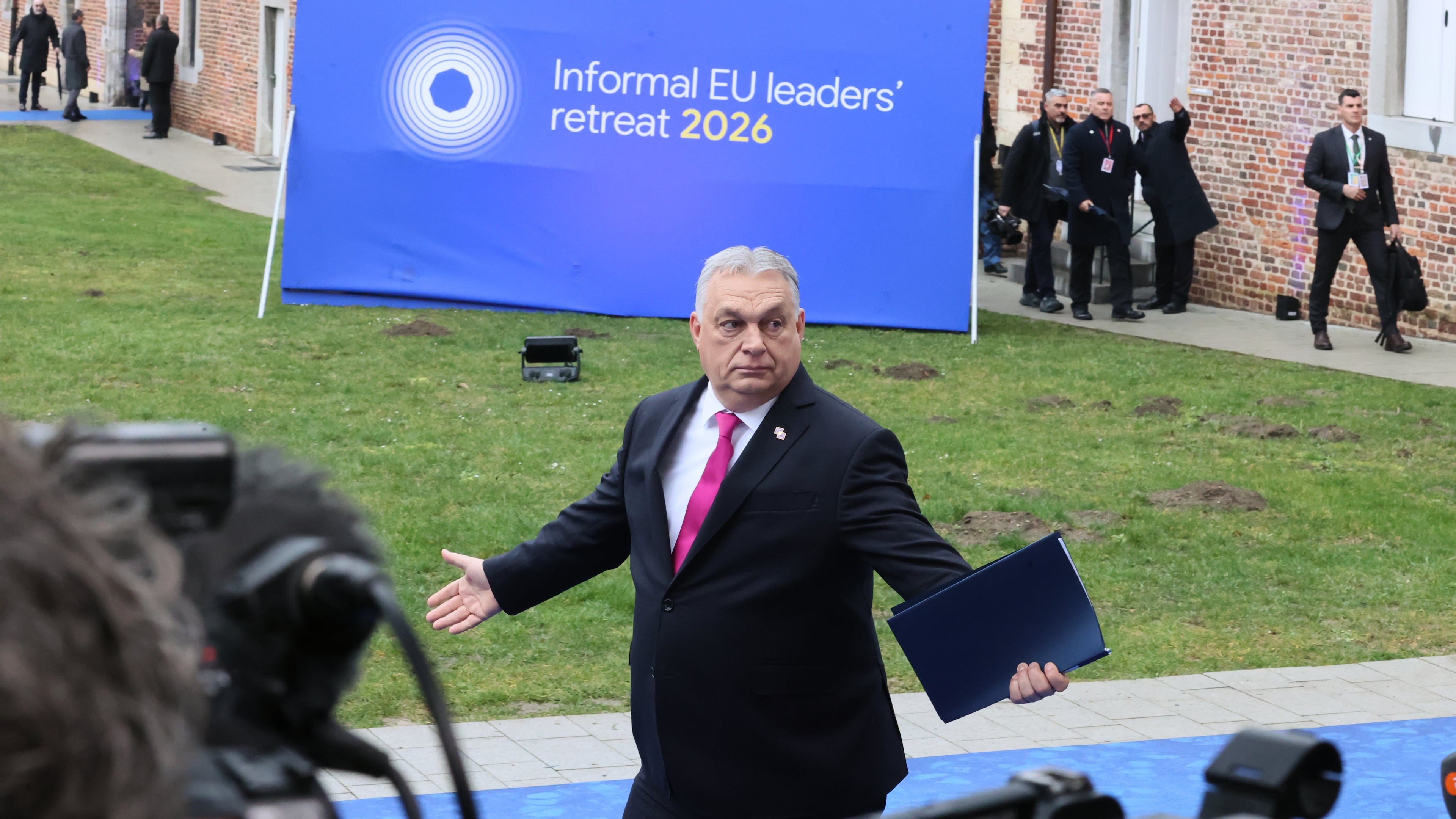 Hungary's Prime Minister Viktor Orban, center, arrives for the EU summit at Alden Biesen Castle in Bilzen-Hoeselt, Belgium, Thursday, Feb. 12, 2026. (AP Photo/Francois Walschaerts)