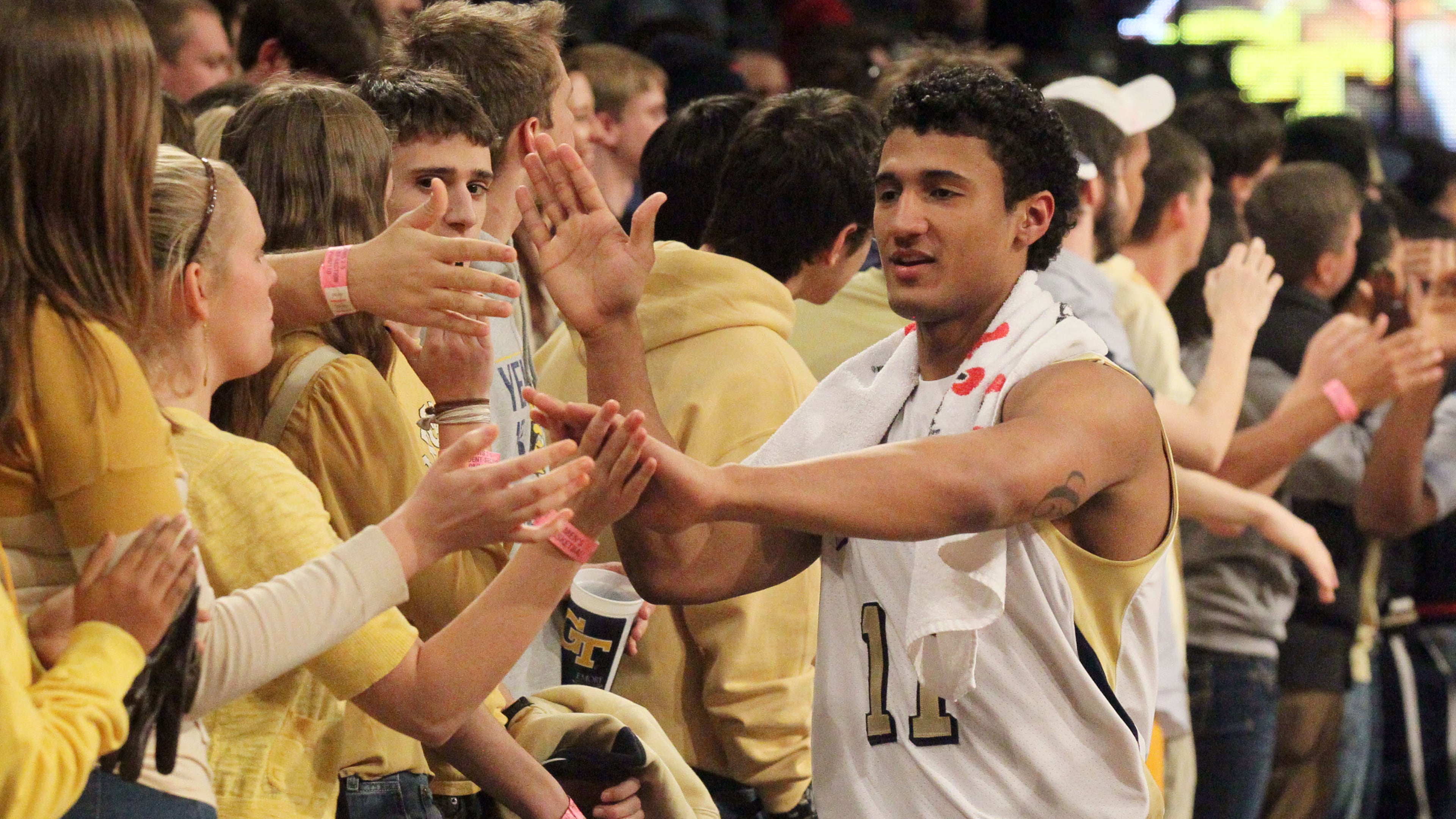 Chris Bolden, seen here with fans after the Yellow Jackets' 82-62 win over Wake Forest at McCamish Pavilion in Atlanta on Jan. 26, 2013, was booked into the Gwinnett County jail at 6 a.m. on Aug. 3, 2013 after his arrest on a DUI charge.