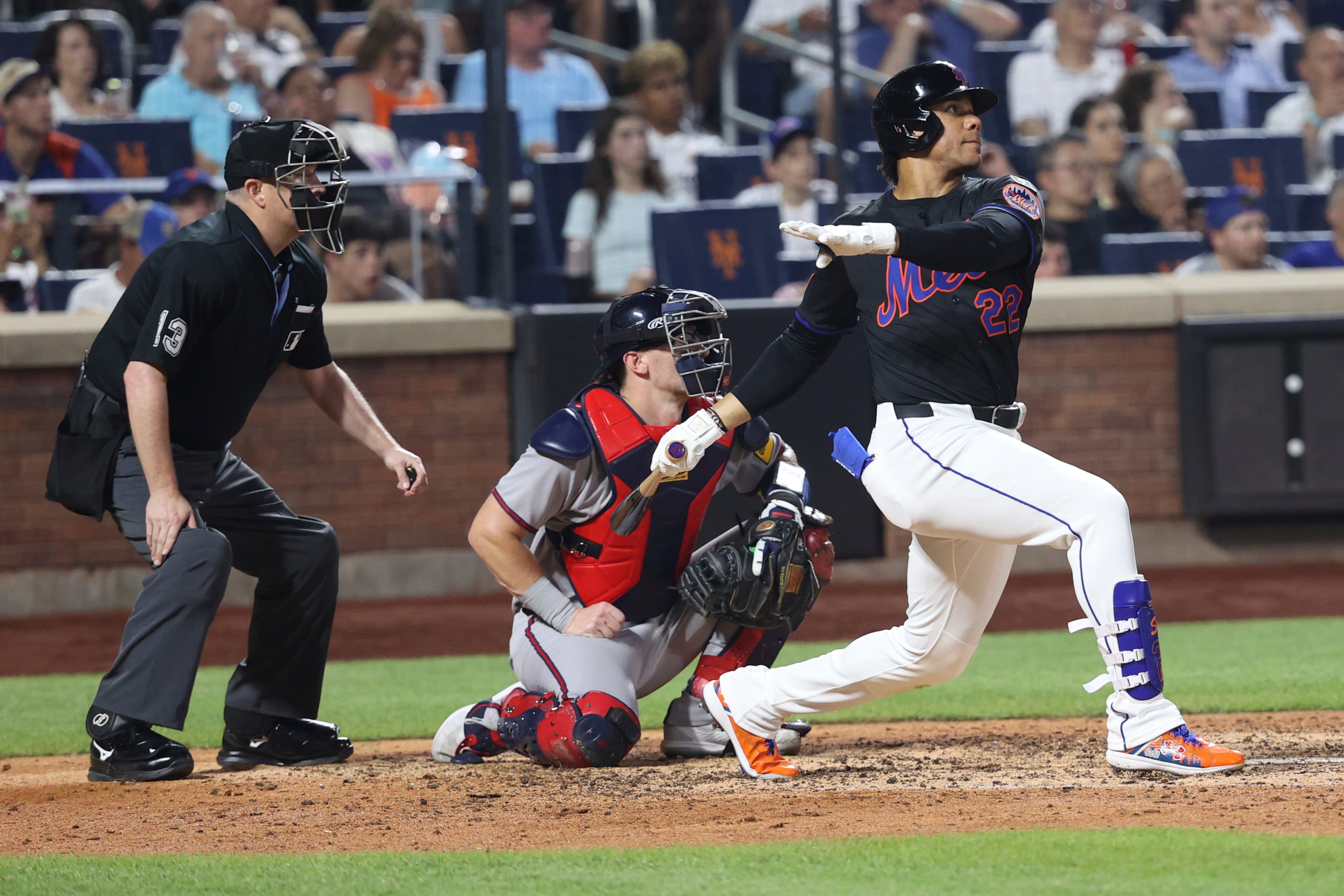 The New York Mets' Juan Soto hits a home run during the sixth inning, leading Brandon Nimmo to score against the Atlanta Braves, on Monday, June 23, 2025, in New York. (Pamela Smith/AP)