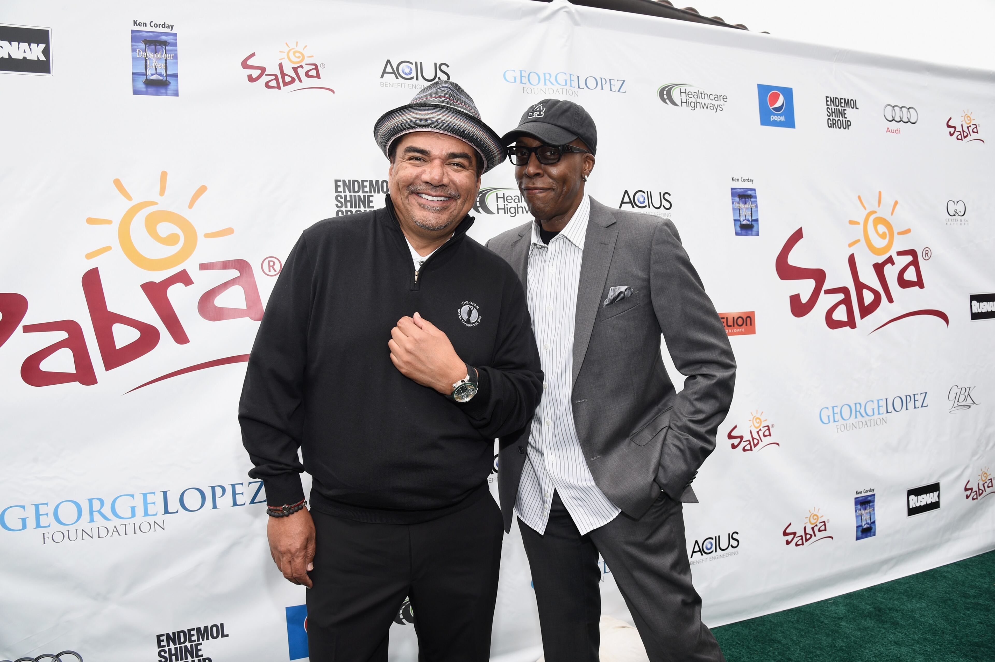 TOLUCA LAKE, CA - MAY 04: Event Host/comedian George Lopez (L) and comedian Arsenio Hall attended the 8th Annual George Lopez Celebrity Golf Classic presented by Sabra Salsa to benefit The George Lopez Foundation on Monday, May 4th at the Lakeside Golf Club on May 4, 2015 in Toluca Lake, California. (Photo by Michael Buckner/Getty Images for The George Lopez Foundation)