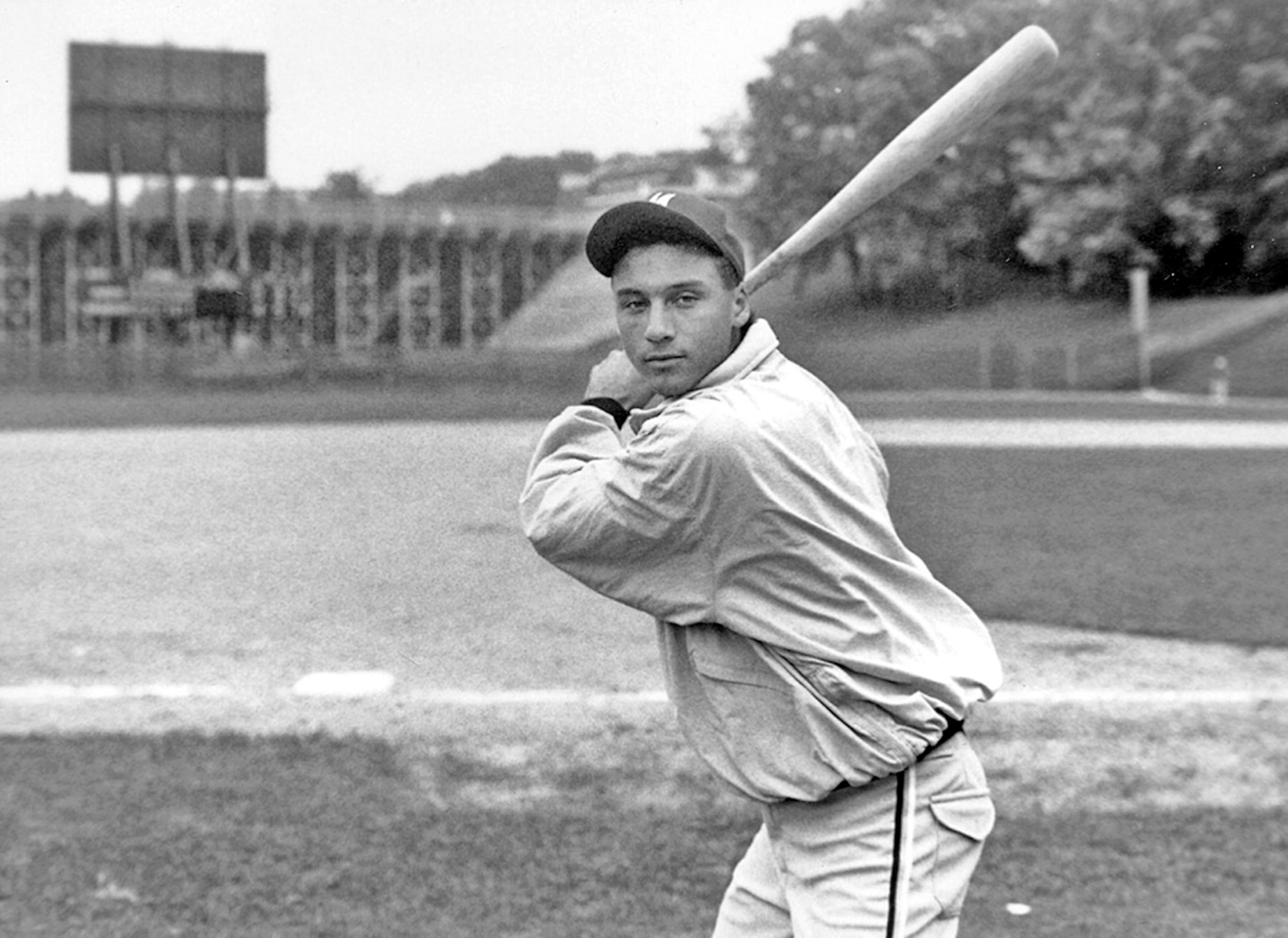 In this photo taken in the early 1990s baseball player Derek Jeter poses for a photo at at Hyames Field at Western Michigan University in Kalamazoo, Mich. A five-time World Series champion and sixth on the career hits list, Jeter, now 40, is set to retire after this season after spending two decades as the shortstop for the New York Yankees. (AP Photo/Kalamazoo Gazette-MLive Media Group)