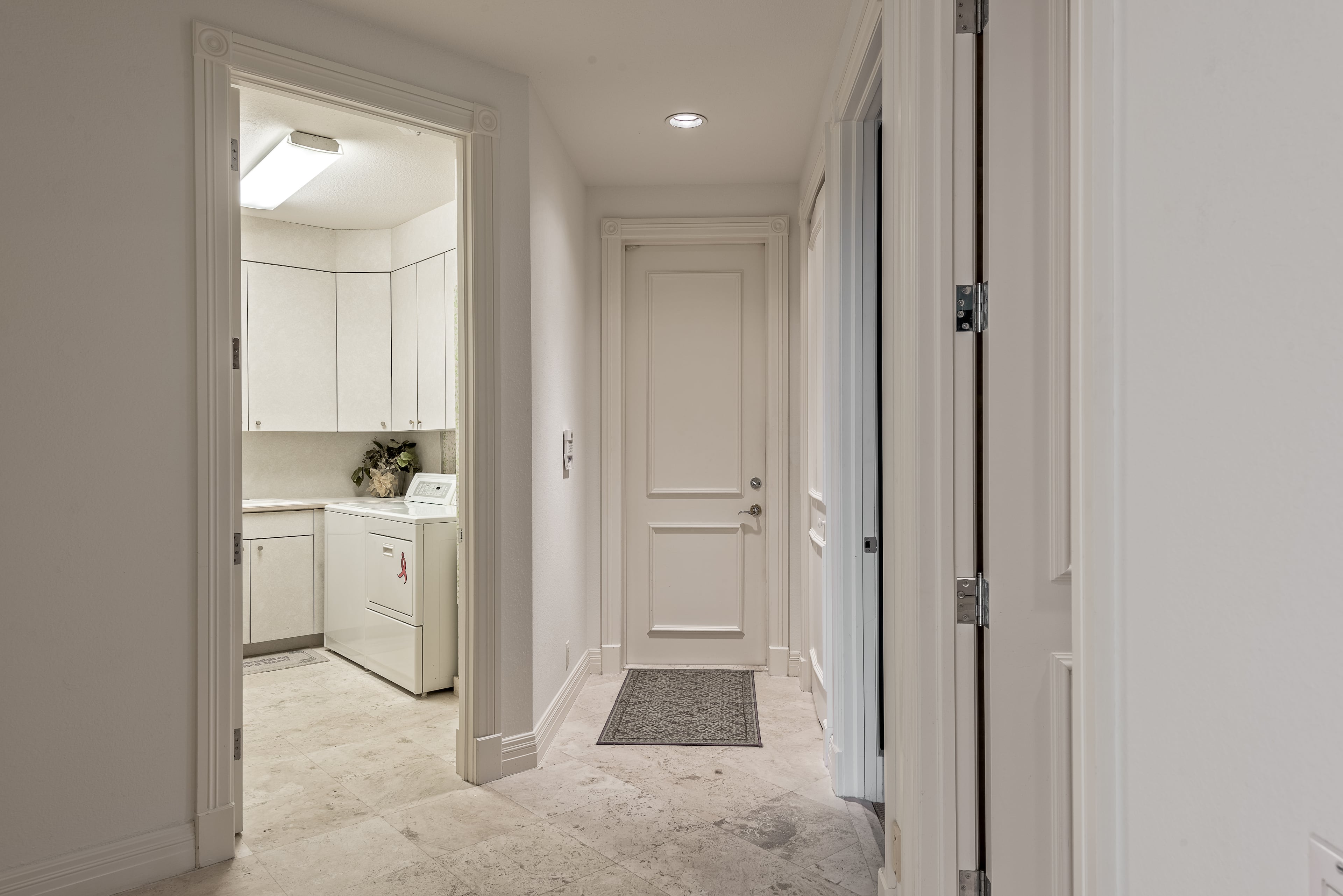 Former GOP presidential hopeful and the future HUD secretary Ben Carson has listed his golf-club community home in Palm Beach, Fla. for $1.2 million. The two-story residence has soaring floor-to-ceiling windows that wonderfully blend the the outside tropical paradise with the interior living spaces. This five bedroom, 6000 ft., and 4.5 bathroom is a mini-mansion that comes with marble floors, custom built-in's throughout, remote operated window coverings along with a tastefully upgraded chefs kitchen. (Listing courtesy ENGEL & VOLKERS Palm Beach)