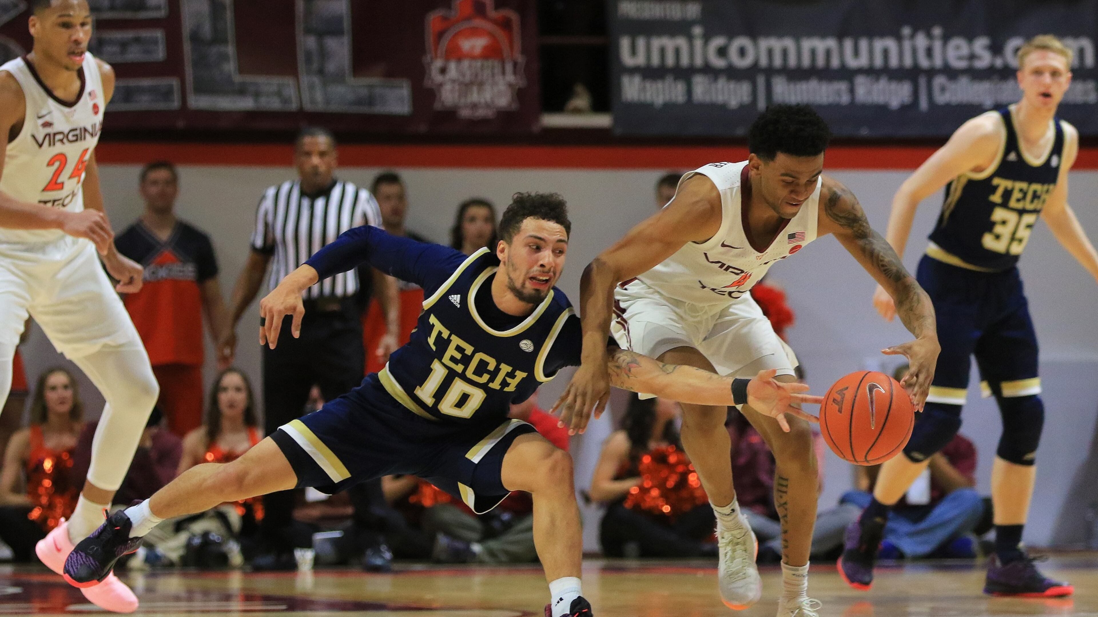 BLACKSBURG, VA - FEBRUARY 13: Jose Alvarado #10 of the Georgia Tech Yellow Jackets and Nickeil Alexander-Walker #4 of the Virginia Tech Hokies reach for the ball in the first half at Cassell Coliseum on February 13, 2019 in Blacksburg, Virginia. (Photo by Lauren Rakes/Getty Images)