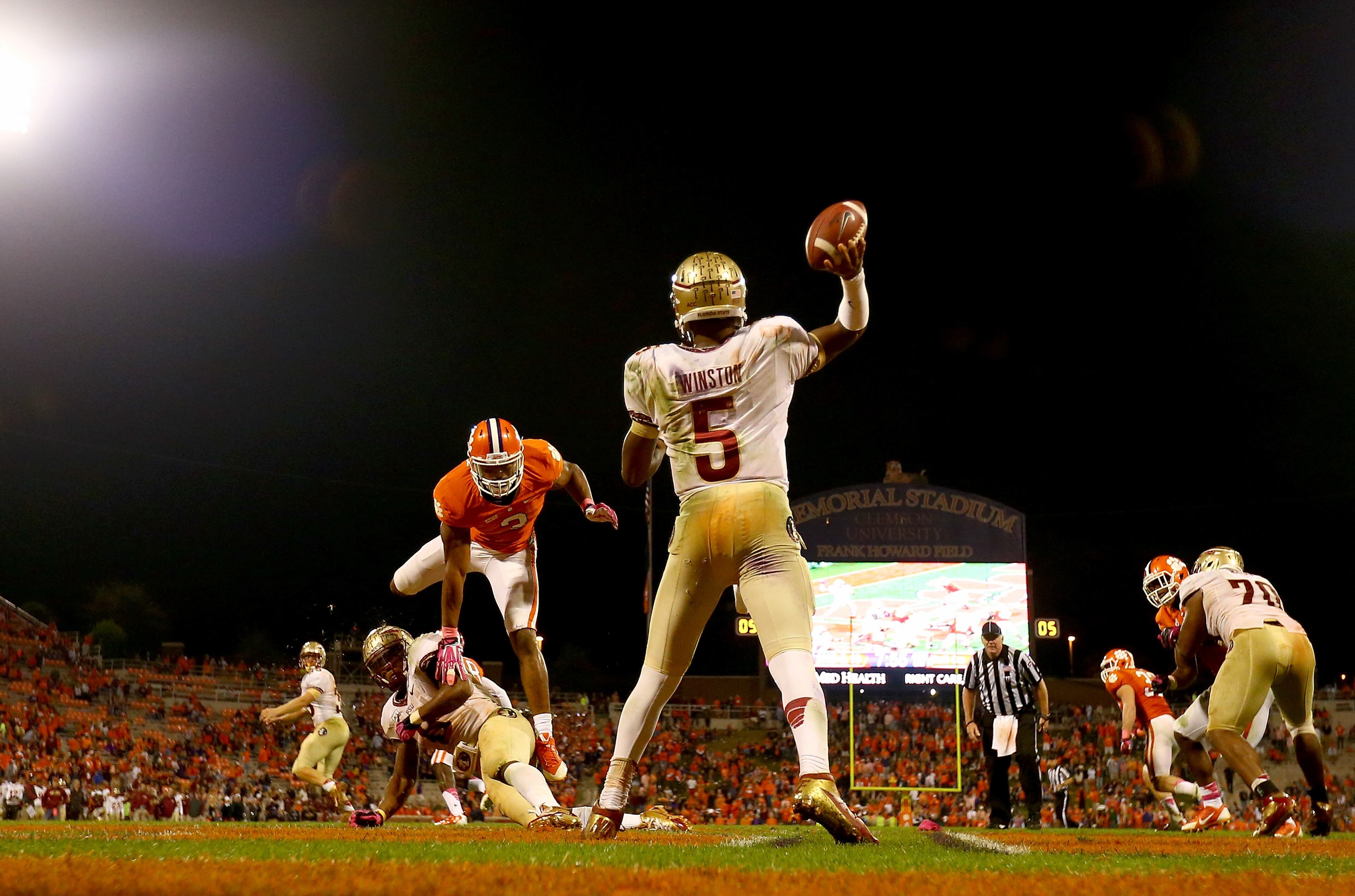 Nov. 15 vs. Clemson. Vic Beasley of the Tigers leaps over a blocker to pursue Florida State quarterback Jameis Winston last season. (Photo by Streeter Lecka/Getty Images)