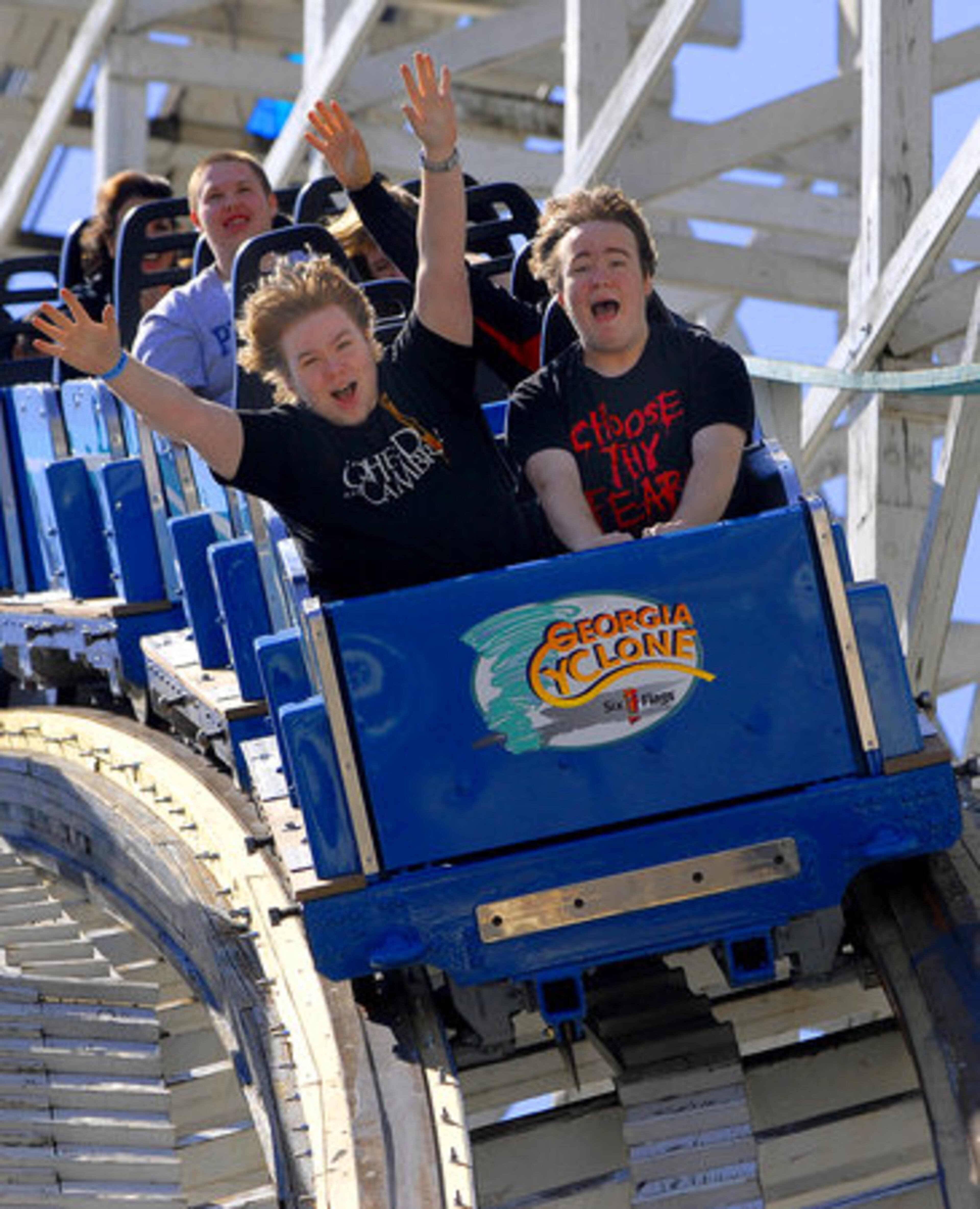 Brothers Spencer (left) and Shane Perry have some fun while taking a ride on the Georgia Cyclone. The pair was in town from Decatur, Ala.