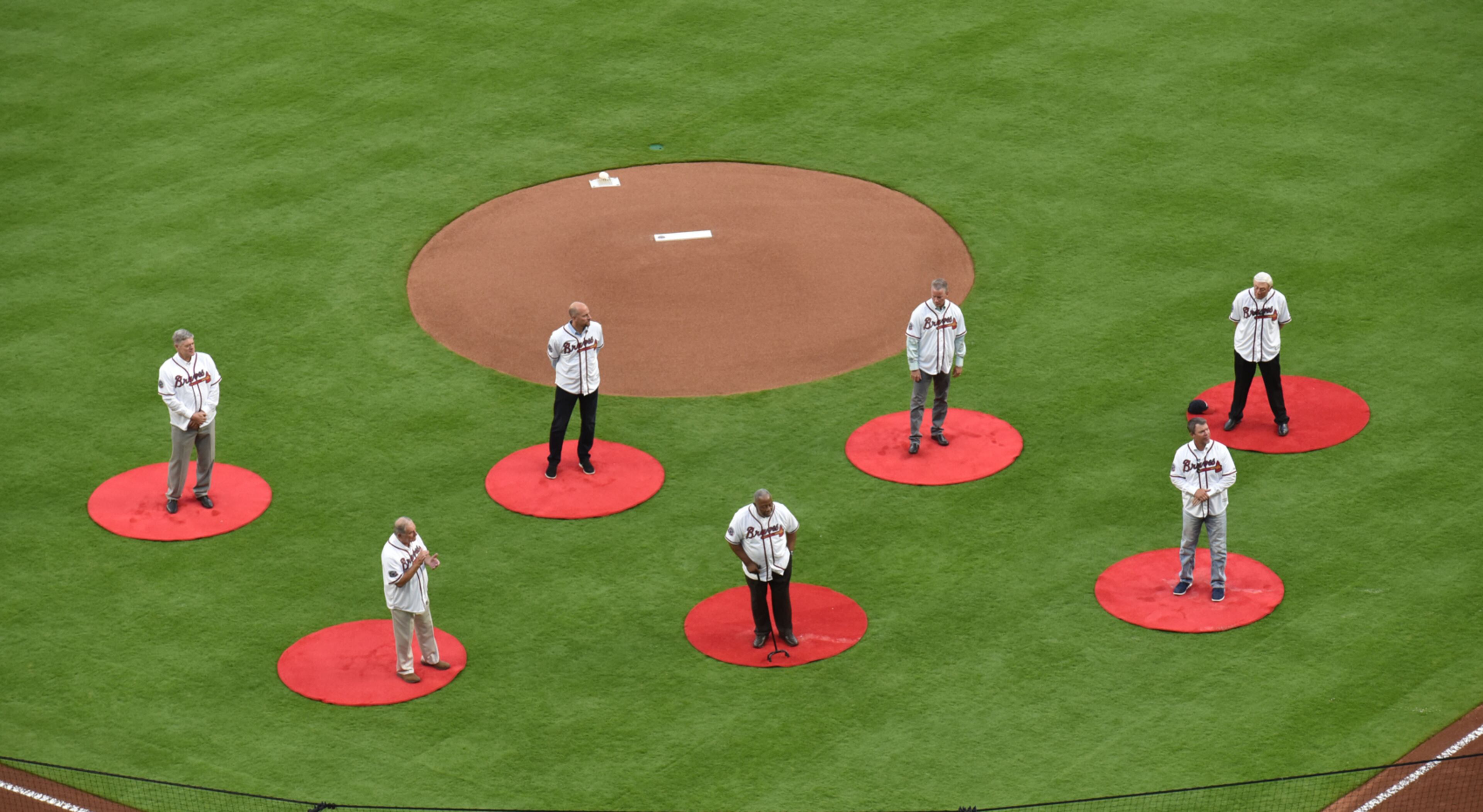 April 14, 2017 ATLANTA Braves legends Dale Murphy (from left), Bobby Cox, John Smoltz, Hank Aaron, Tom Glavine, Chipper Jones and Phil Niekro are honored in the pregame ceremonies before the Atlanta Braves play the San Diego Padres in the season opener in the new SunTrust Park Friday, April 14, 2017. The Braves will officially marked the completion of SunTrust Park with the unveiling of the retired numbers. HYOSUB SHIN / AJC