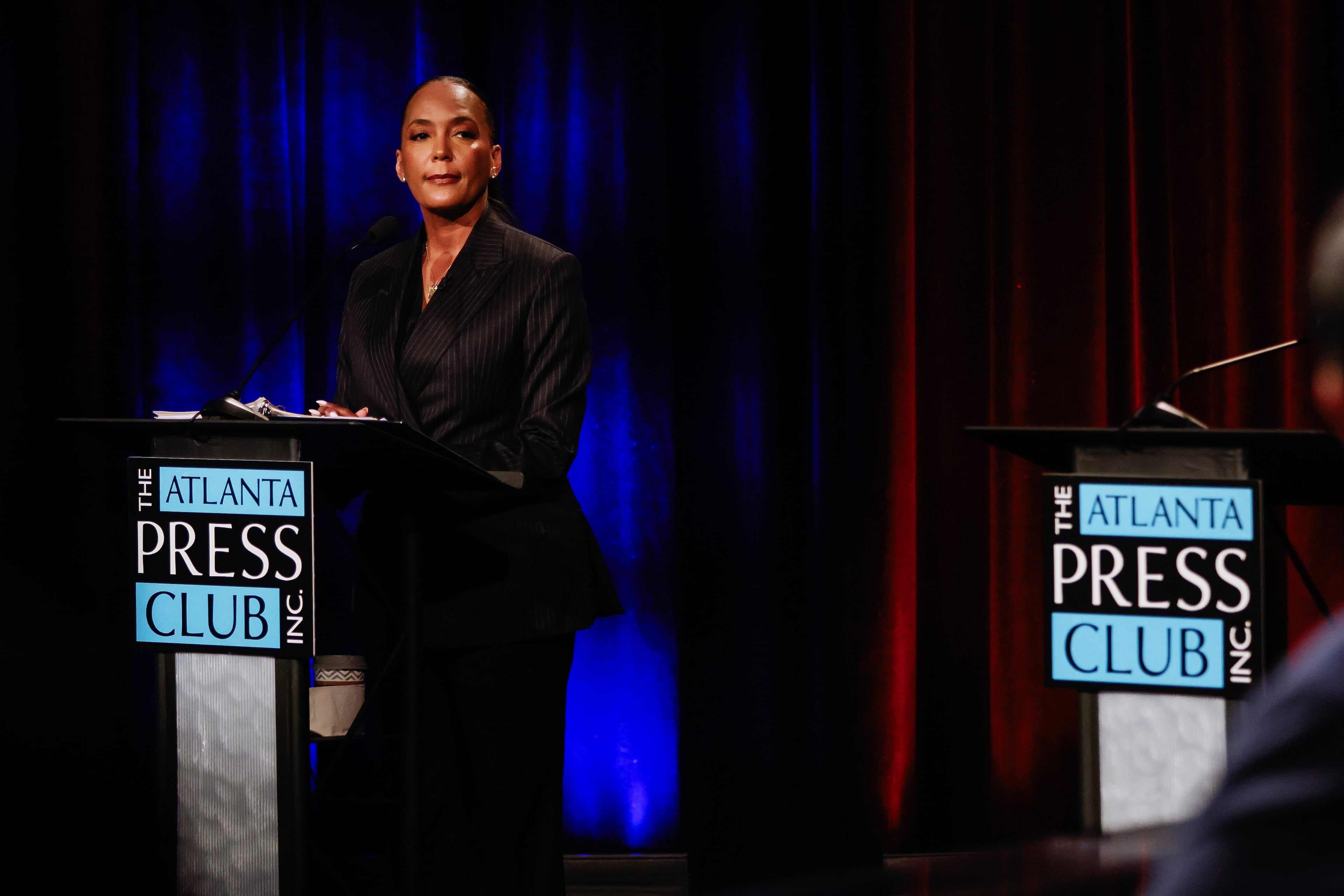 Democratic nominee for governor Keisha Lance Bottoms participates in the Atlanta Press Club Loudermilk-Young governor's debate on Monday in Atlanta while standing next to an empty lectern. Republican nominee Rick Jackson declined the invitation. (Abbey Cutrer/AJC)