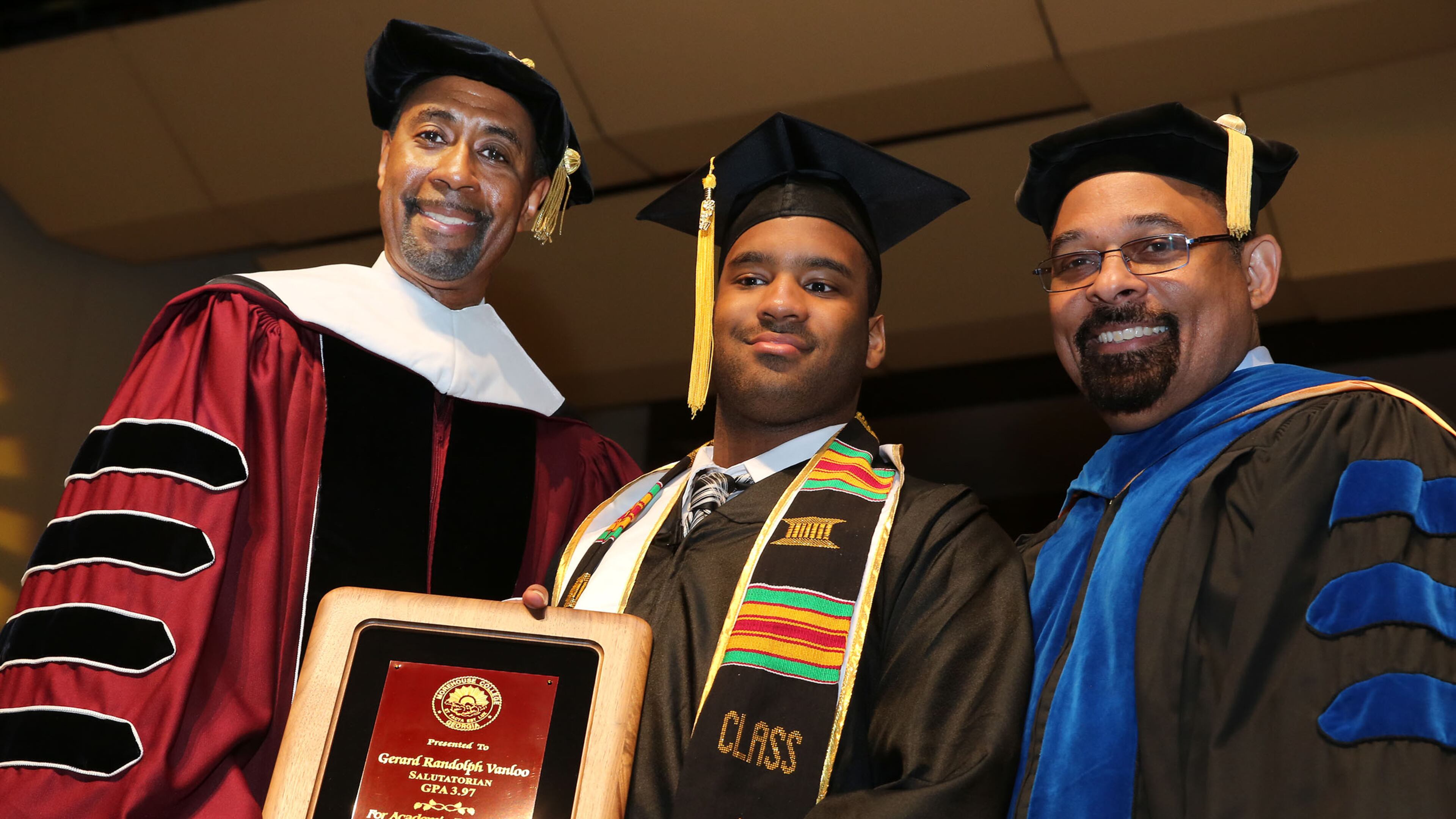 From left to right: Bill Taggart, then Morehouse's interim president, Gerard Vanloo, the college's salutatorian for 2017, and Michael Hodge. PHOTO CREDIT: MOREHOUSE COLLEGE.