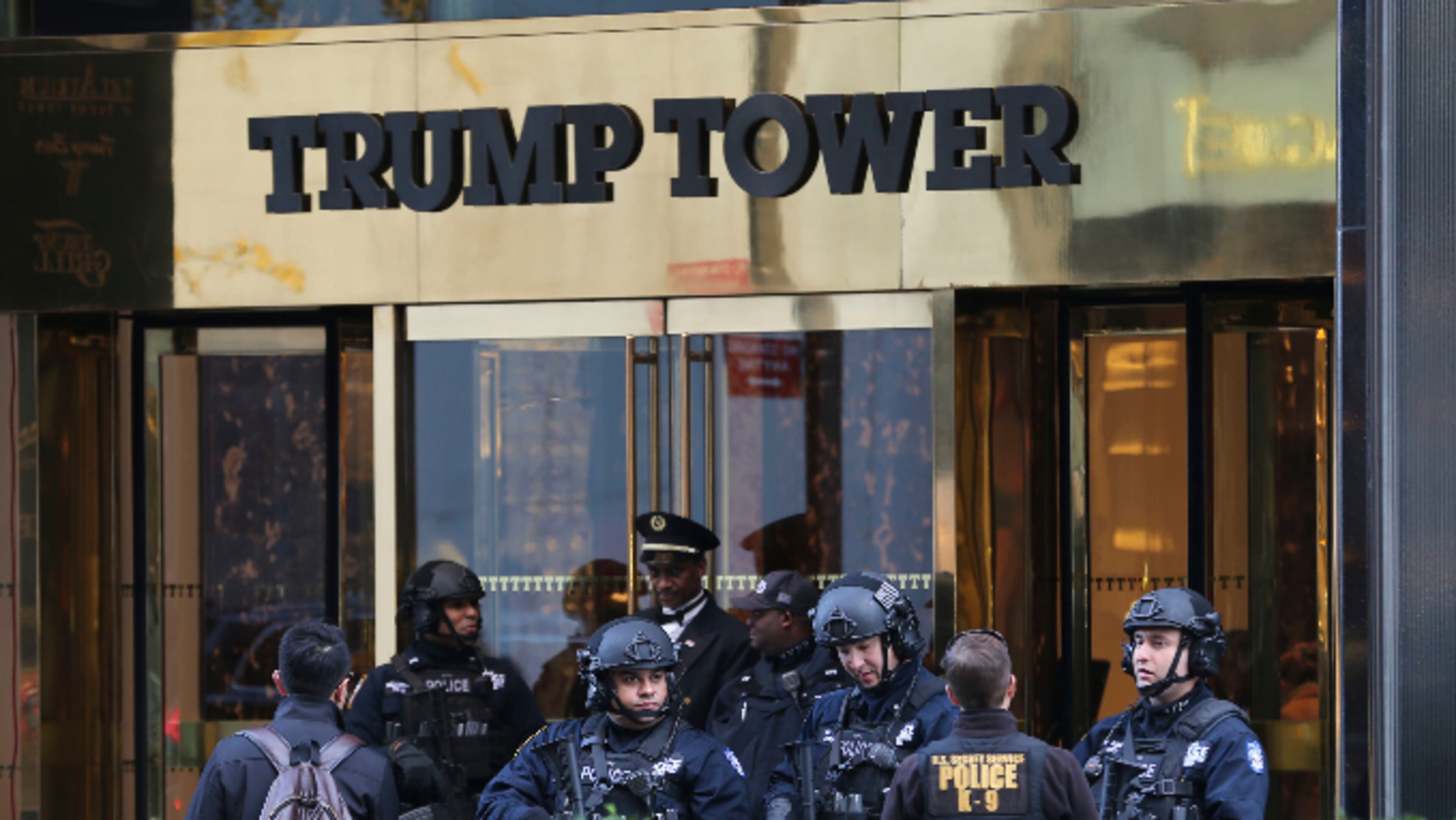 In this Nov. 17, 2016 file photo, security personnel stand at the front entrance of Trump Tower in New York. (AP Photo/Seth Wenig, File)
