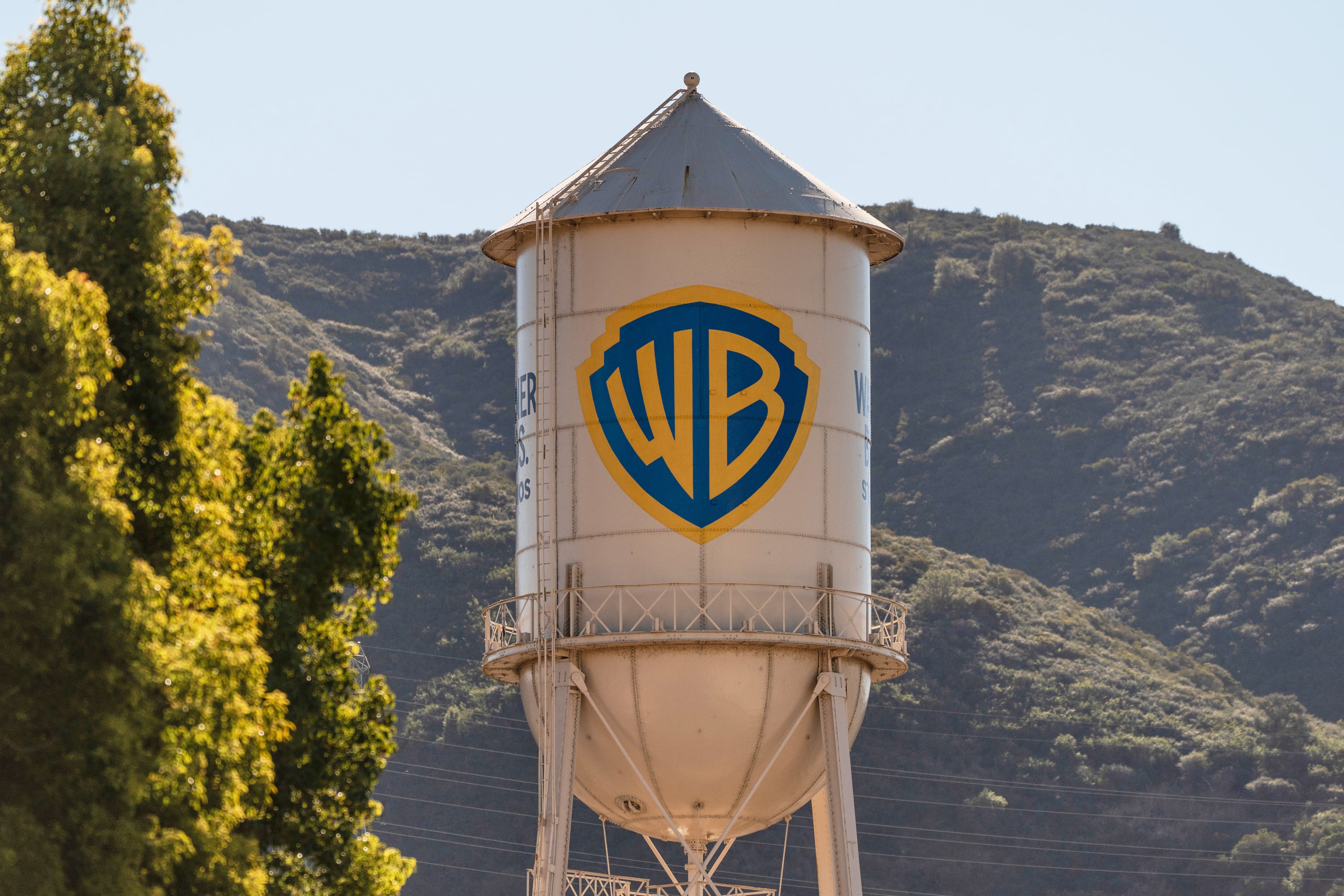 The Warner Bros. water tower at Warner Bros. Studios in Burbank, Calif., is shown on Dec. 5, 2025. The studios' merger with Paramount will close on Oct. 6. (Jae C. Hong/AP)