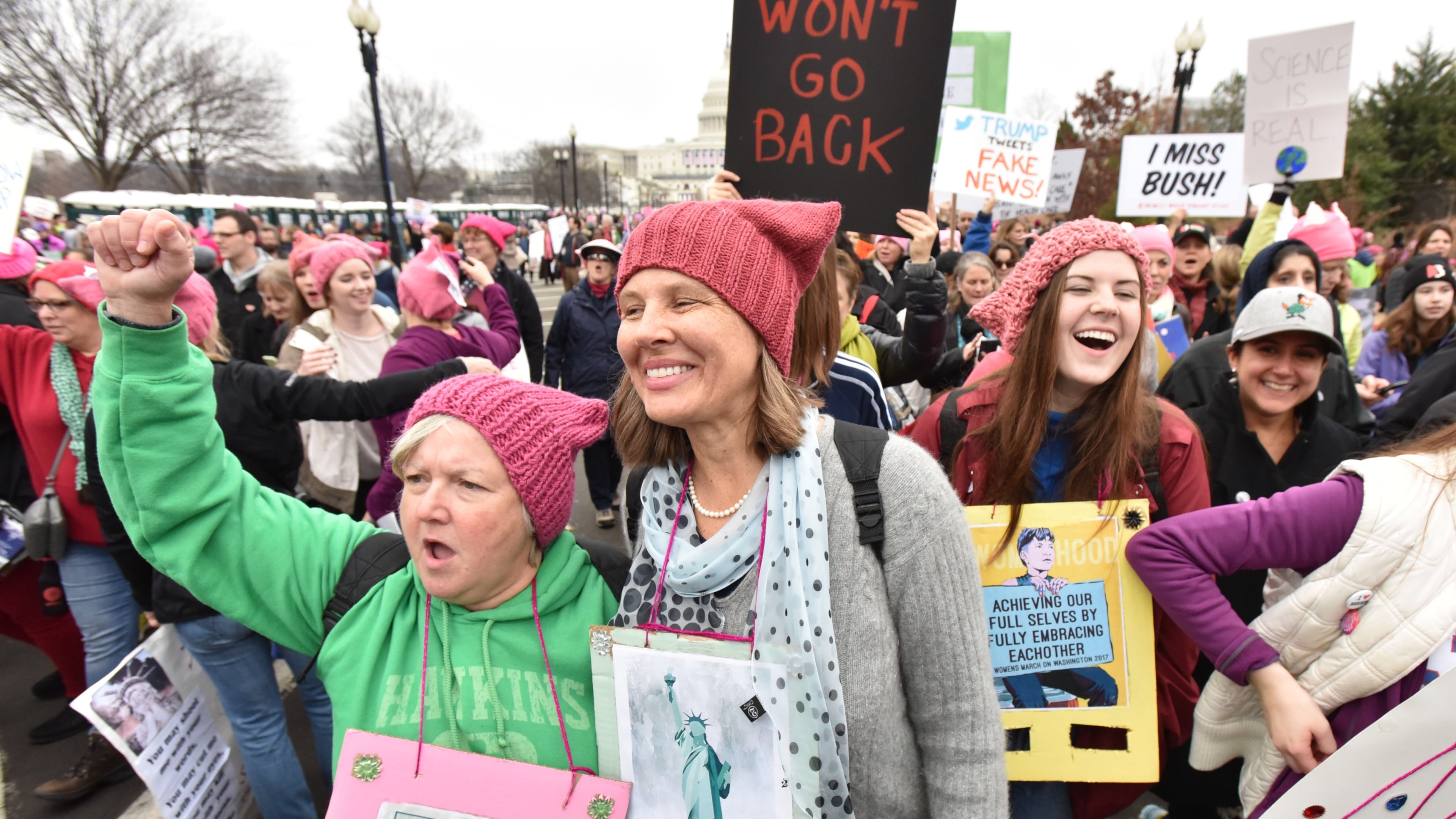 January 21, 2017 Washington D.C. - A group from Decatur, from left, Kay Hinton and Lynn Adams, and Katie Adams, 18, walk toward the U.S. Capitol for the Women’s March on Washington on Saturday, January 21, 2017. They rode a bus overnight to participate this event. The Women’s March on Washington is a grassroots effort comprised of dozens of independent coordinators at the state level. HYOSUB SHIN / HSHIN@AJC.COM
