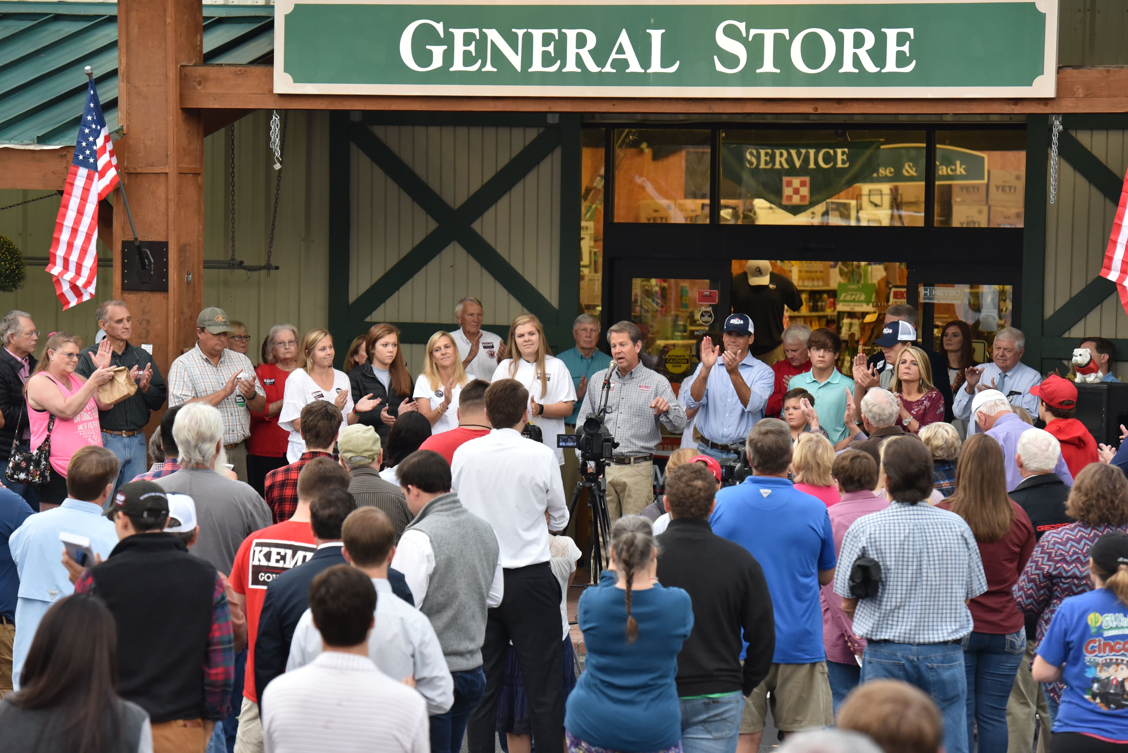 November 2, 2018 Statesboro - GOP gubernatorial candidate Brian Kemp speaks to Bulloch County voters during The Georgia Republican Party "Road to Victory" Bus Tour at Anderson General Store in Statesboro early Friday morning, November 2, 2018. The race for Georgia governor is as close as itâs ever been according to an Atlanta Journal-Constitution/Channel 2 Action News poll released Thursday that heightens the possibility of a December runoff between Democrat Stacey Abrams and Republican Brian Kemp. HYOSUB SHIN / HSHIN@AJC.COM