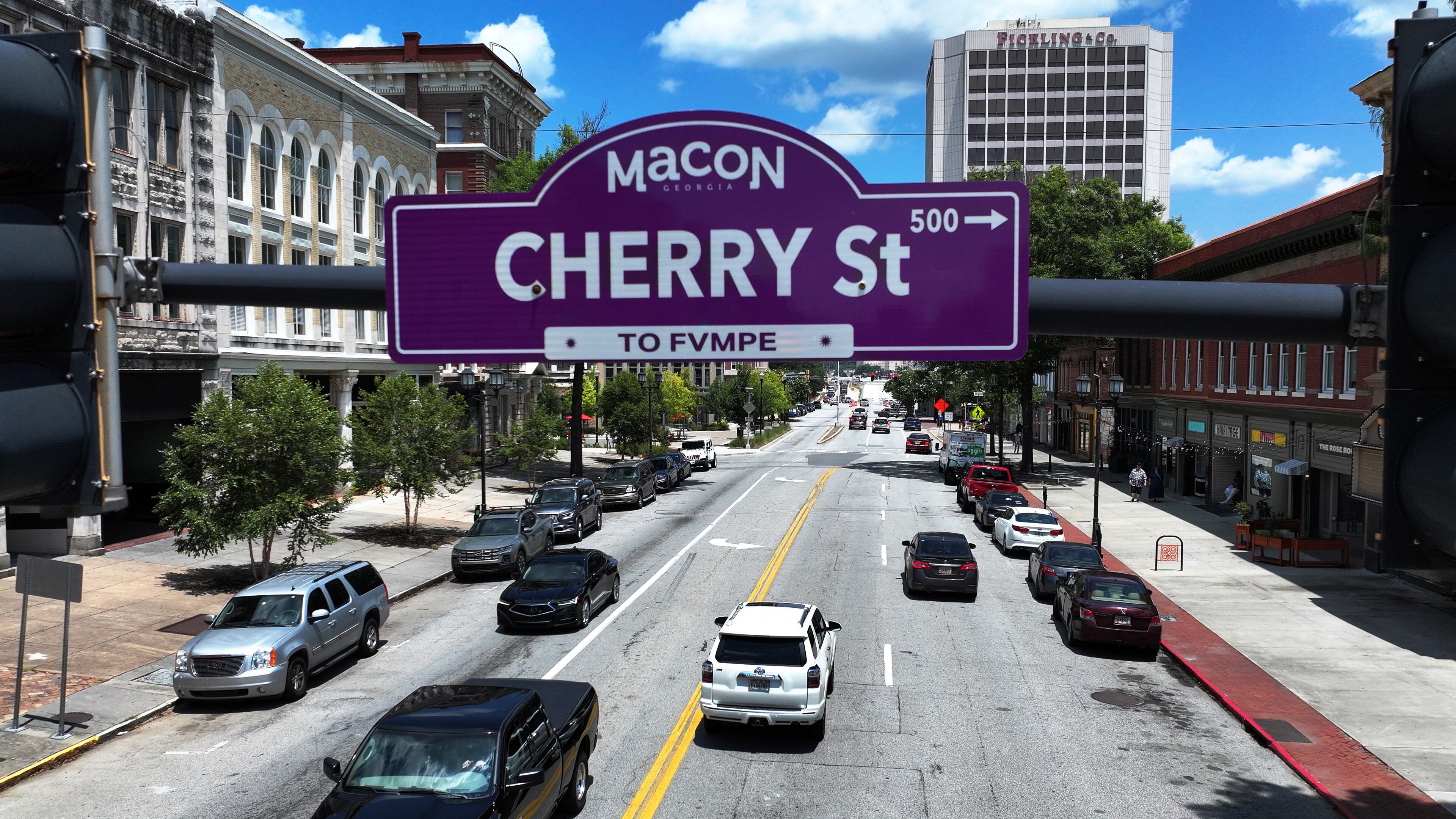 Street signs in downtown Macon now feature both English and Muscogee language names as part of an effort to honor the history and traditions of the area's original inhabitants. (Hyosub Shin/AJC)