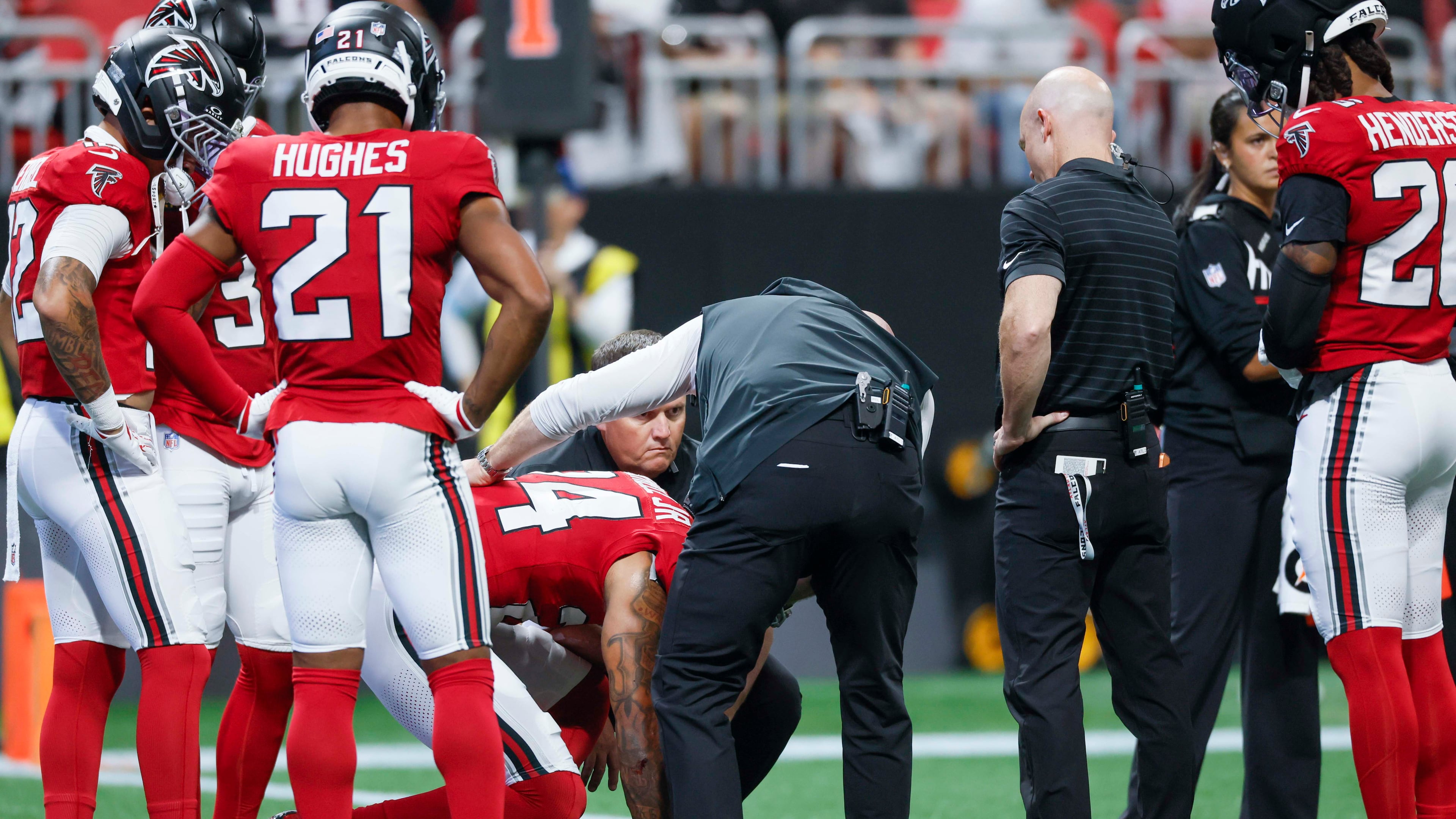 Atlanta Falcons cornerback A.J. Terrell Jr. (24) receives assistance from the medical staff after an injury timeout in the first half of an NFL game against the Carolina Panthers at Mercedes-Benz Stadium in Atlanta on Sunday, Sept. 20, 2026. (Miguel Martinez/AJC)