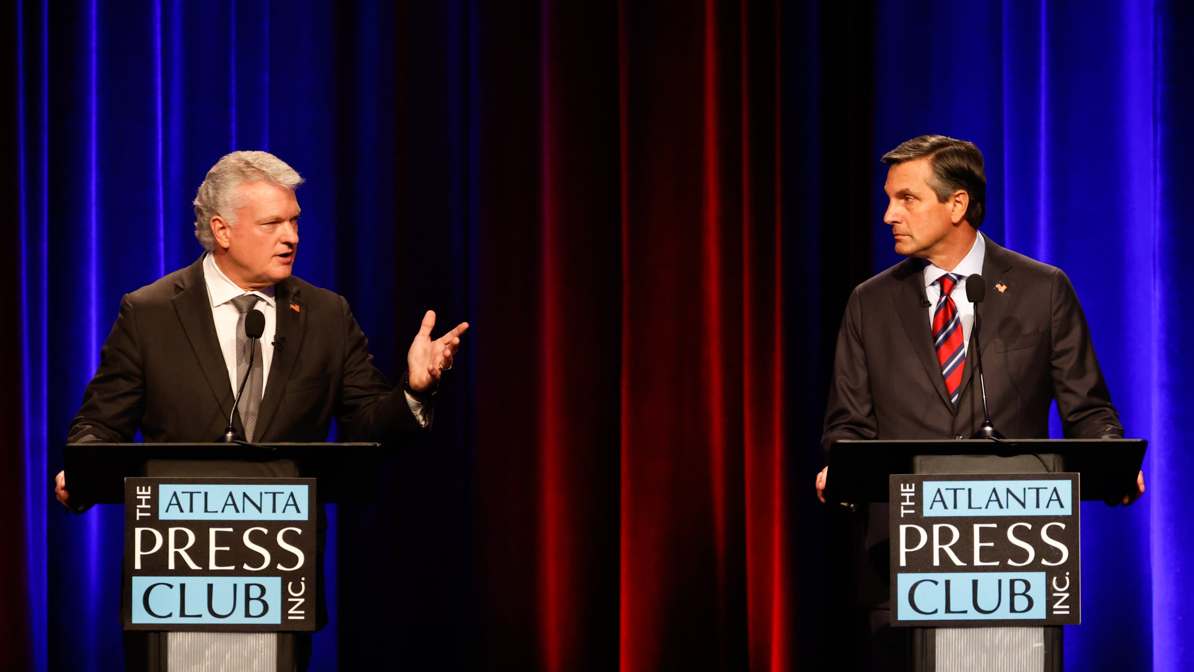 (L-R) Republican U.S. Senate candidates Mike Collins, who is a U.S. representative, and Derek Dooley debate at the Atlanta Press Club Loudermilk-Young Debate Series at Georgia Public Broadcasting in Atlanta on May 31, 2026. (Arvin Temkar/AJC)