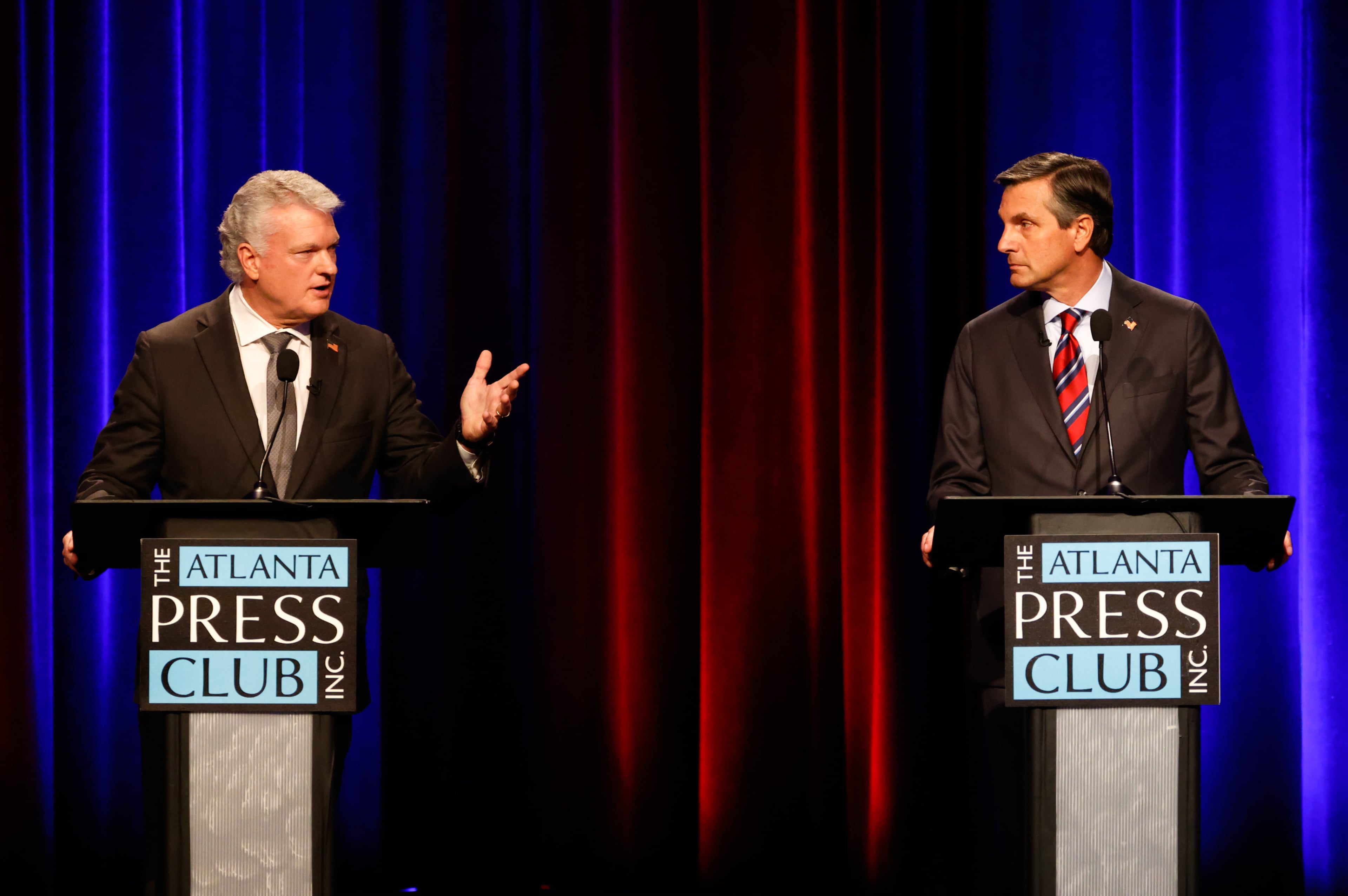 (L-R) Republican U.S. Senate candidates Mike Collins, who is a U.S. representative, and Derek Dooley debate at the Atlanta Press Club Loudermilk-Young Debate Series at Georgia Public Broadcasting in Atlanta on May 31, 2026. (Arvin Temkar/AJC)