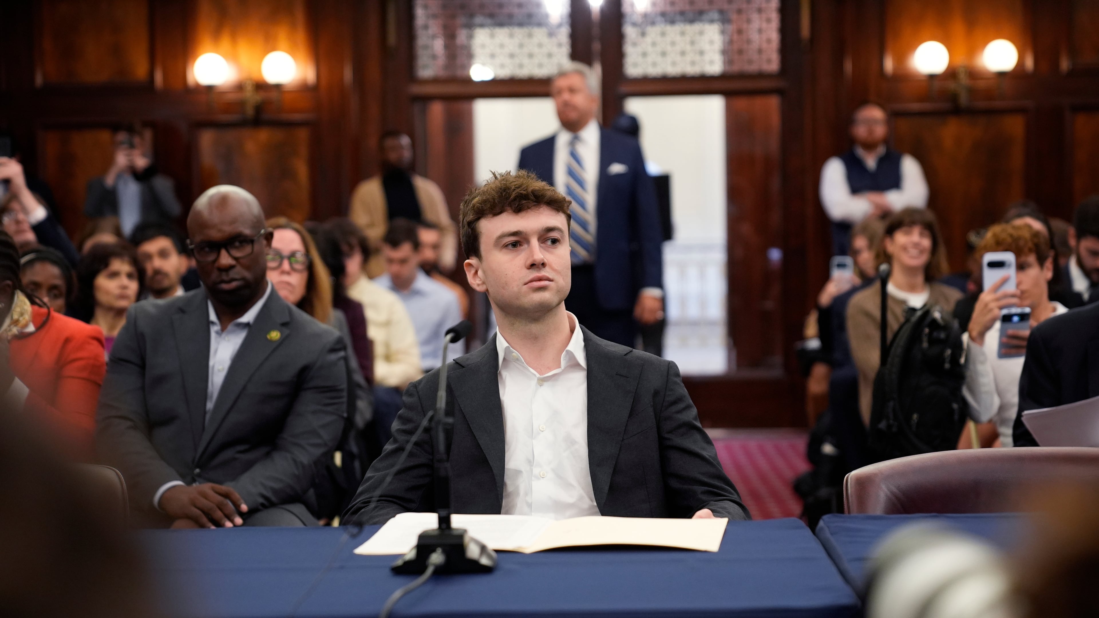 Jacob Coxon gets ready to testify at the New York City Council hearing on artificial intelligence safety in New York, Monday, Oct. 5, 2026. (AP Photo/Seth Wenig)