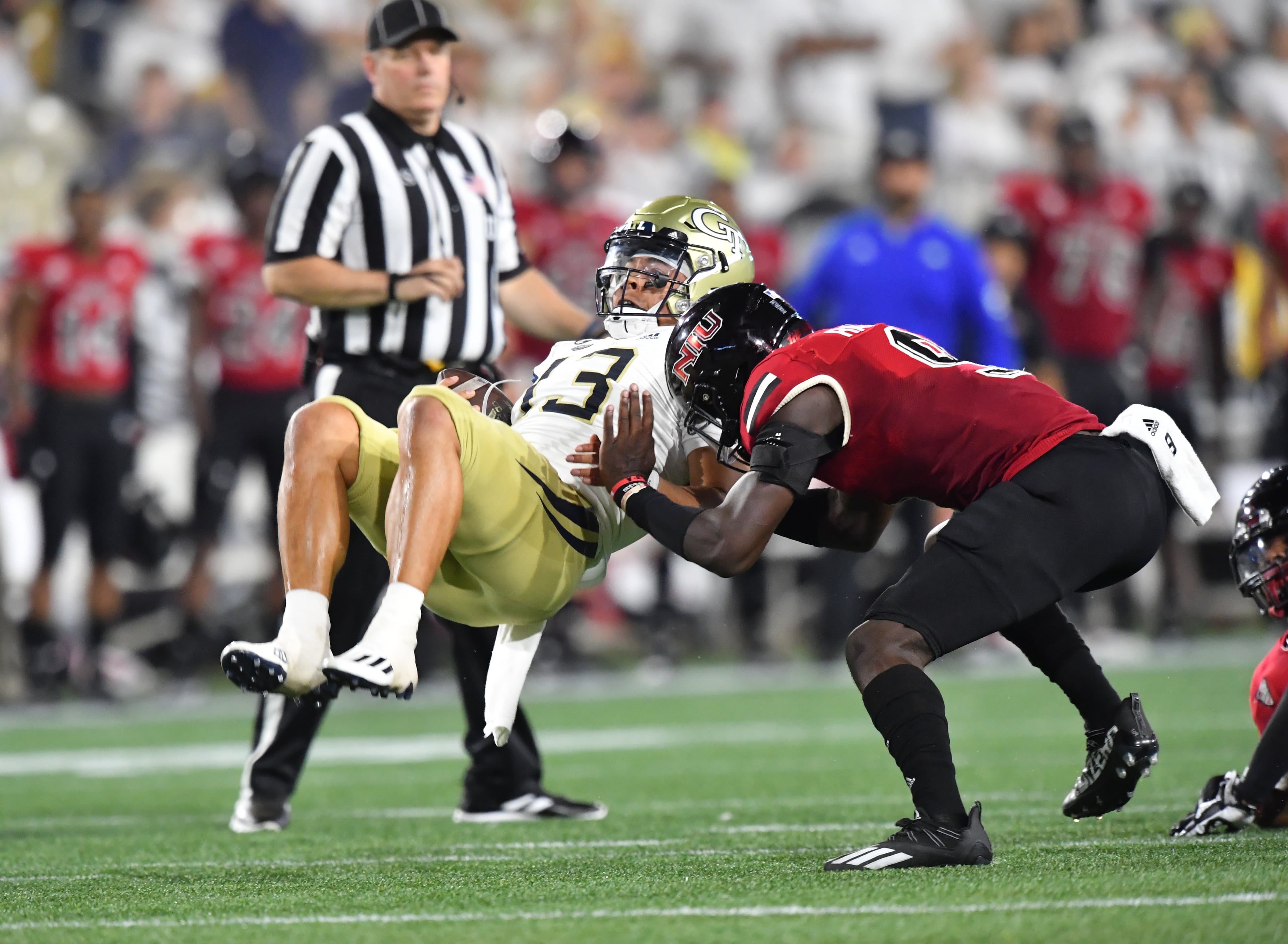 Georgia Tech's quarterback Jordan Yates (13) falls during the first half of an NCAA college football game at Georgia Tech's Bobby Dodd Stadium in Atlanta on Saturday, September 4, 2021. (Hyosub Shin / Hyosub.Shin@ajc.com)