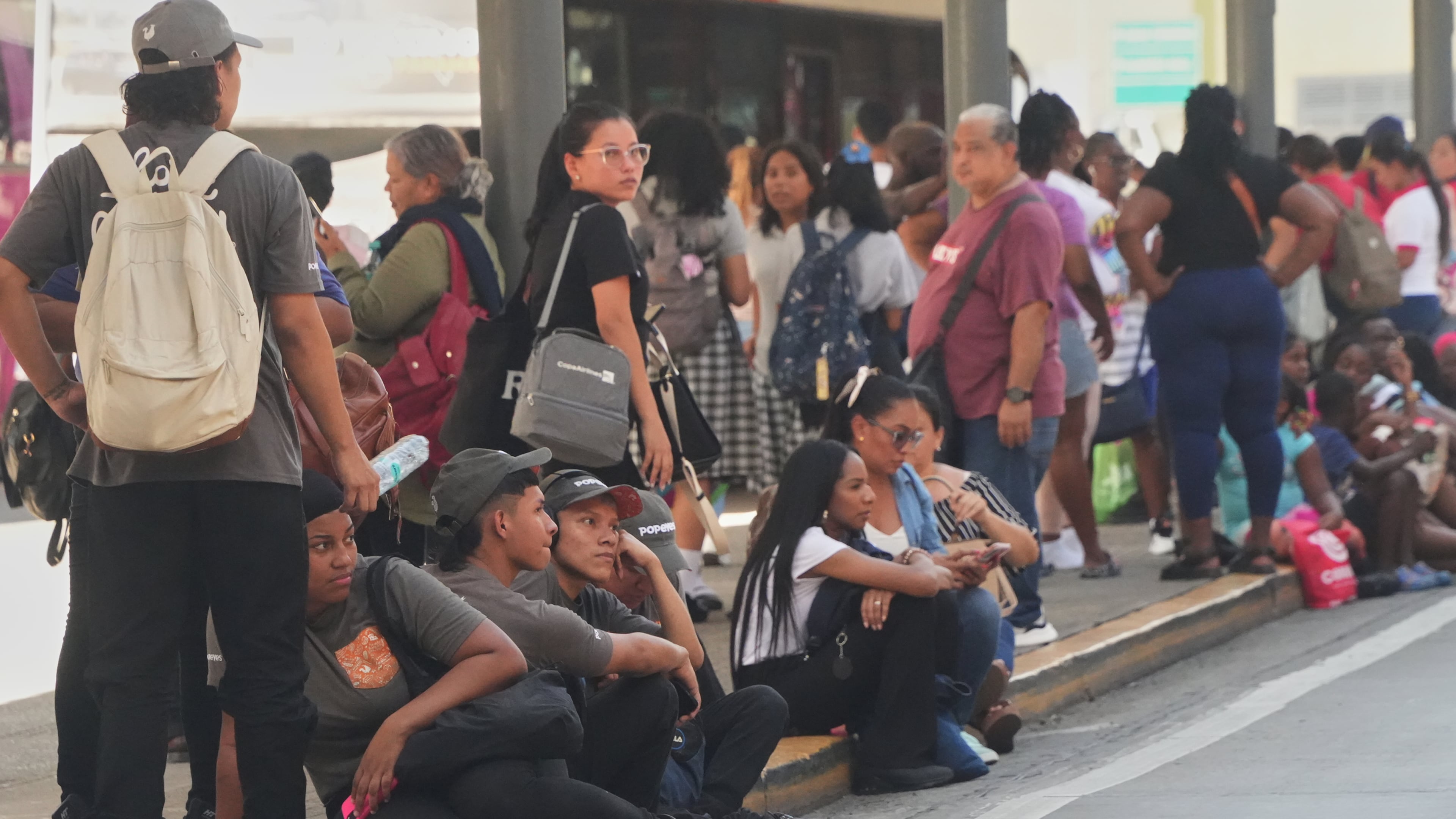 People gather outside shopping mall after an earthquake hit Panama City, Friday, Oct. 9, 2026. (AP Photo/Aris Mariota)