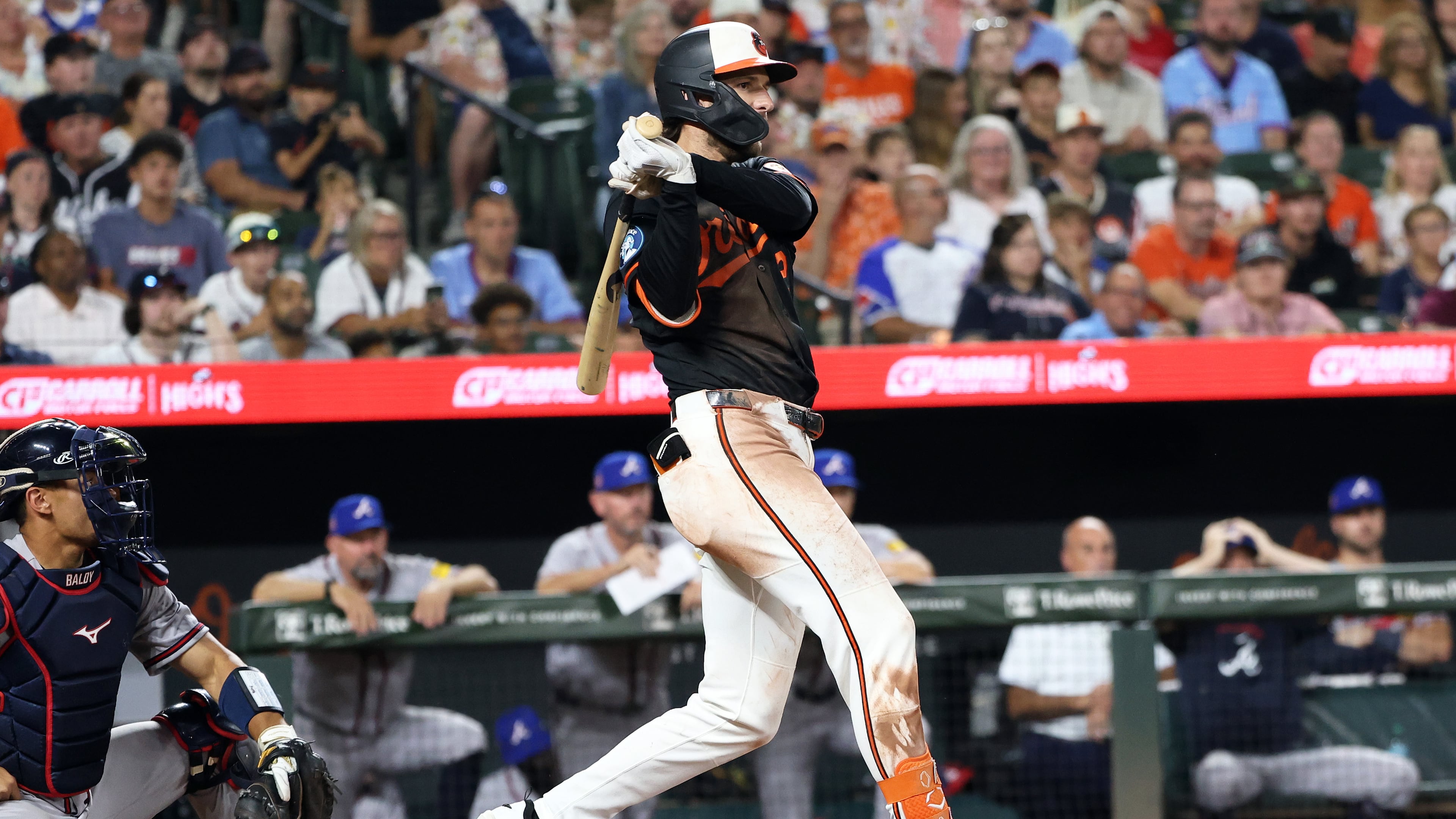 Baltimore Orioles' Dylan Beavers hits an RBI single during the ninth inning of a baseball game against the Atlanta Braves, Saturday, July 25, 2026, in Baltimore. (AP Photo/Daniel Kucin Jr.)