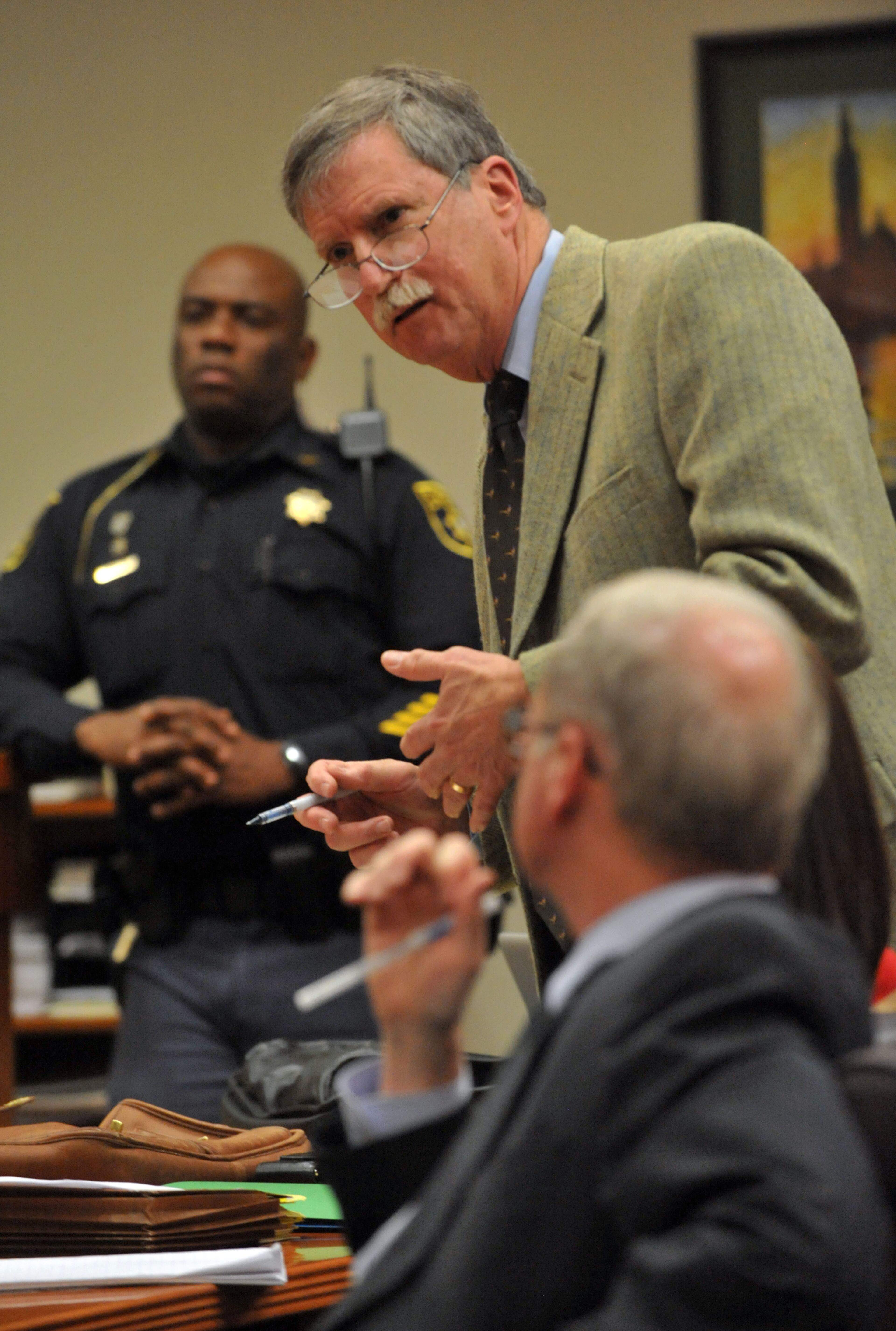 Defense attorney John Petrey discusses a motion.
