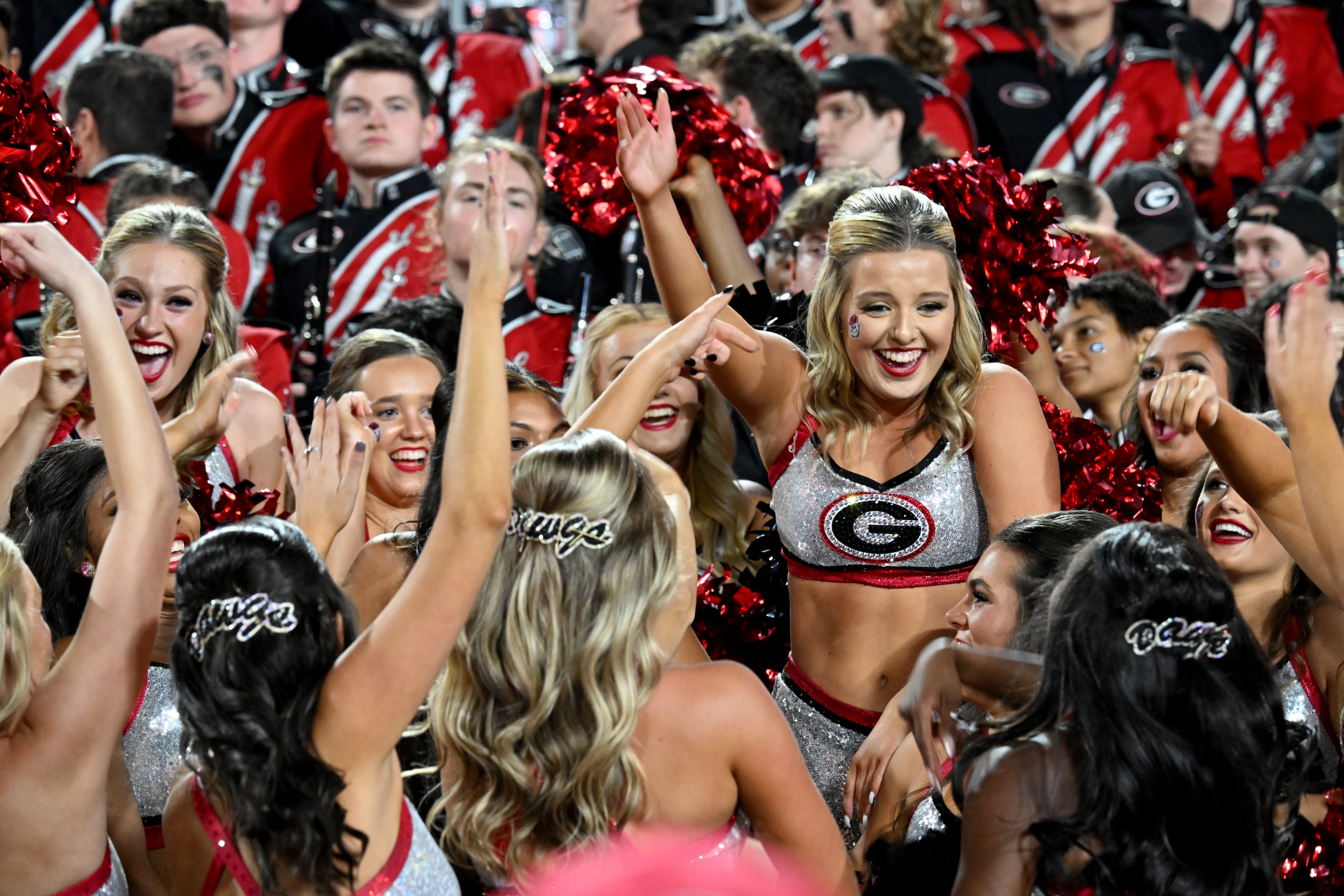 Georgia cheerleaders cheer before an NCAA football game between Georgia and Tennessee at Sanford Stadium, Saturday, November 16, 2024, in Athens. (Hyosub Shin / AJC)
