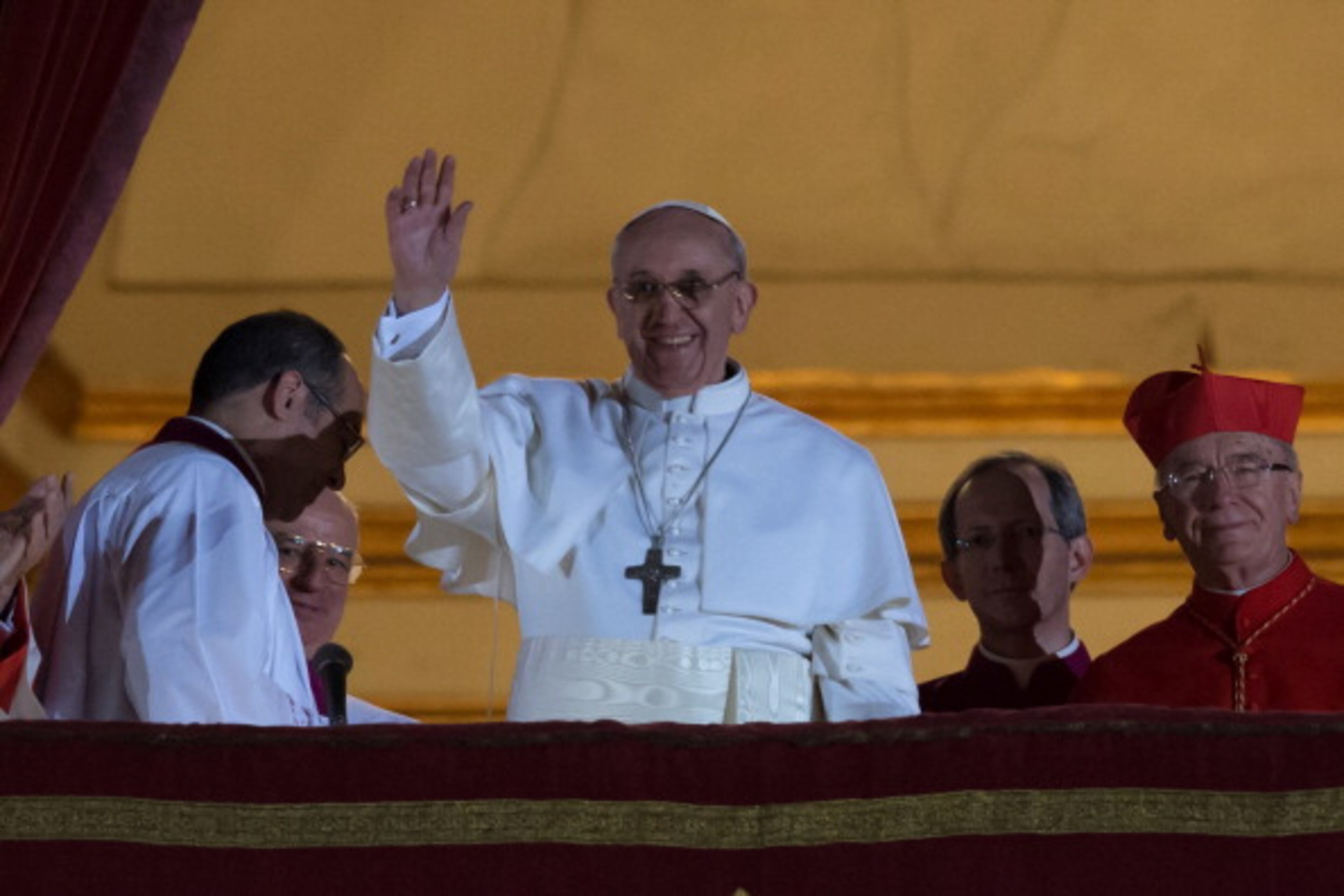 Argentina's Jorge Bergoglio, elected Pope Francis I waves from the window of St Peter's Basilica's balcony after being elected the 266th pope of the Roman Catholic Church on March 13, 2013 at the Vatican. AFP PHOTO / VINCENZO PINTO (Photo credit should read VINCENZO PINTO/AFP/Getty Images)