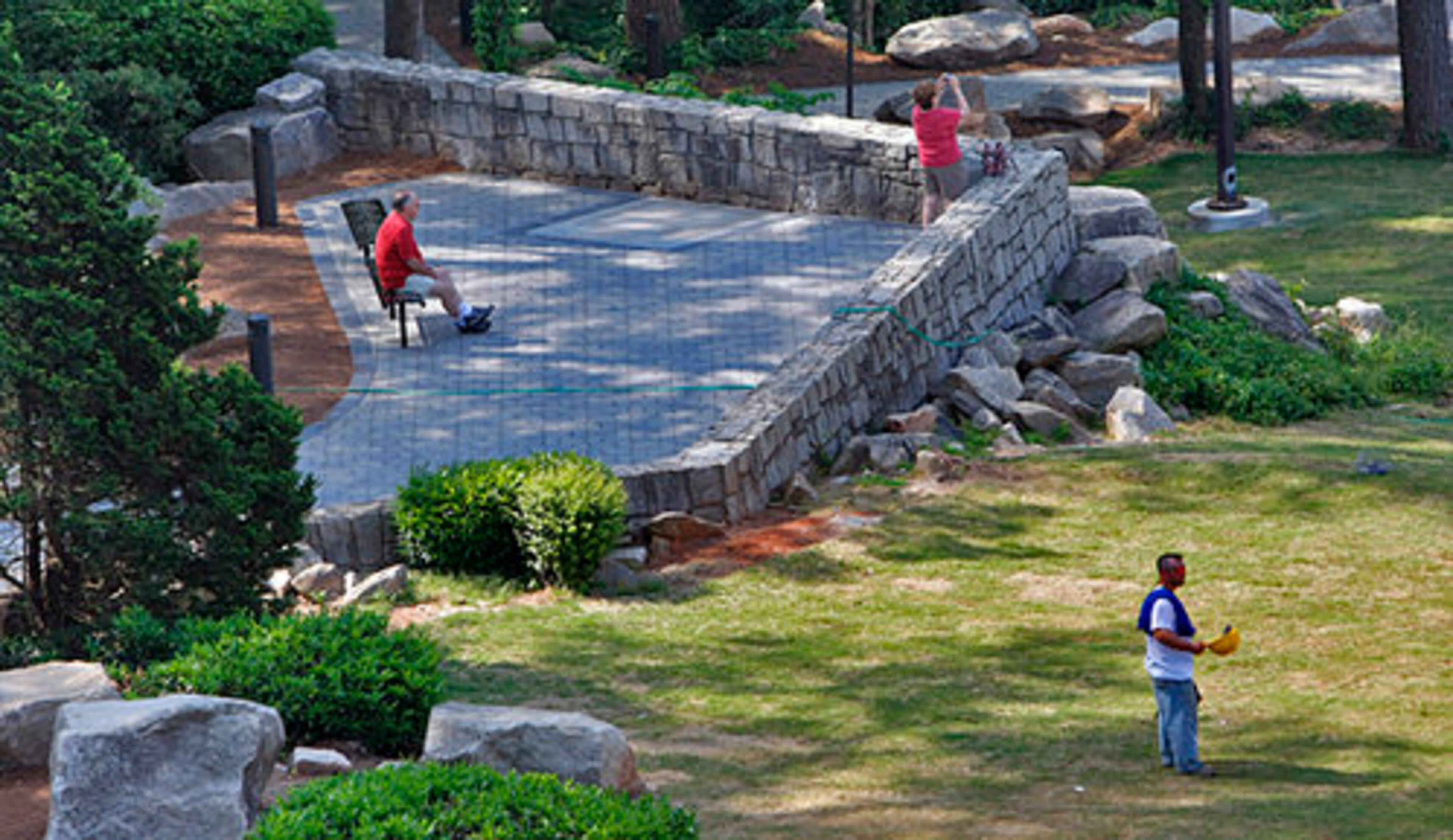 Visitors check out the new terraces, still under construction.