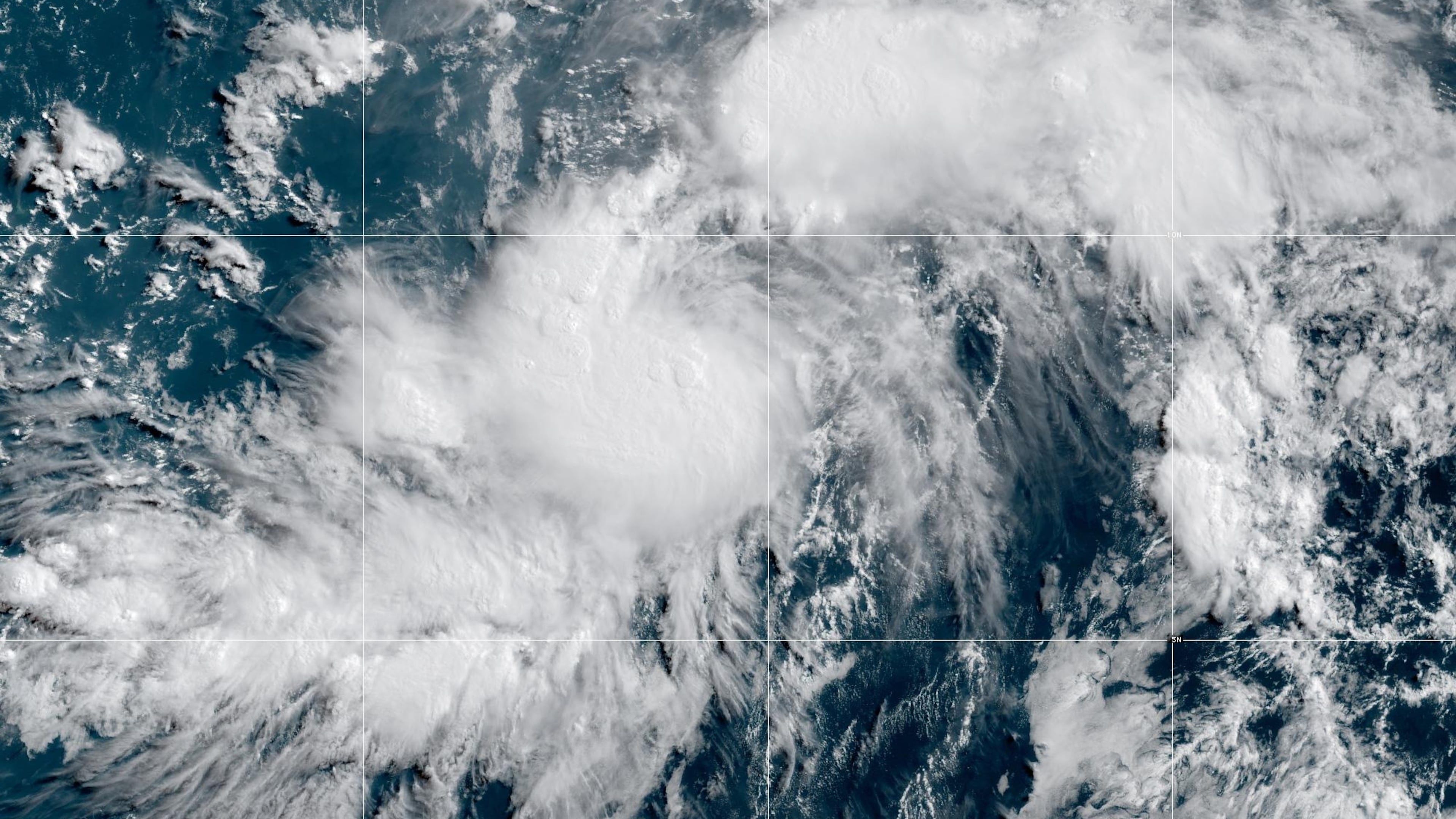 This GOES-19 GeoColor satellite image provided by NOAA shows Tropical Storm Genevieve in the Eastern Pacific on Friday, July 24, 2026. (NOAA via AP)