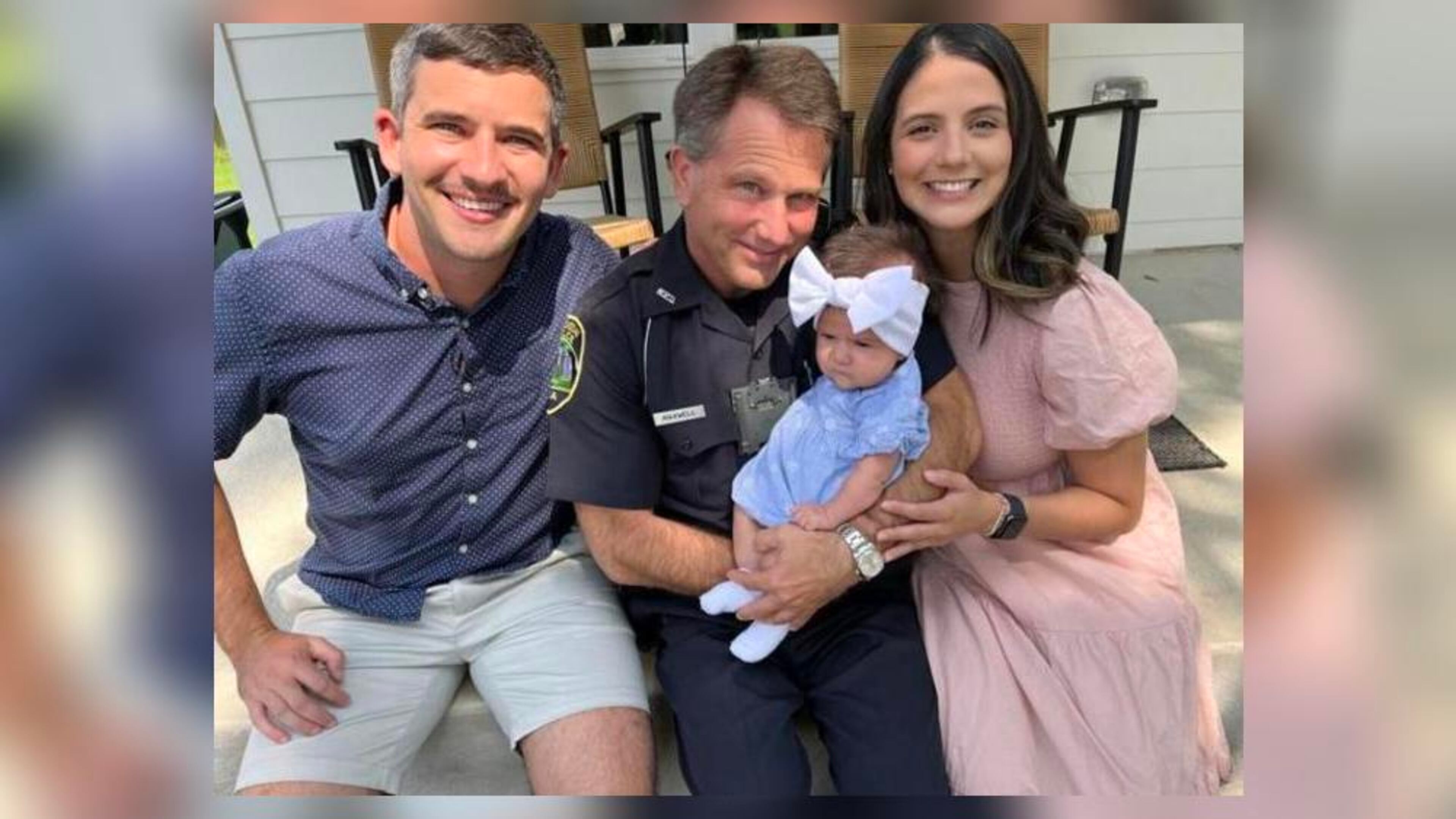 Officer Mike Maxwell visits with Lucia Connelly, the baby whose life he saved back in May, along with the baby's parents Josiah and Val Connelly. (Courtesy of Patrick Yost)