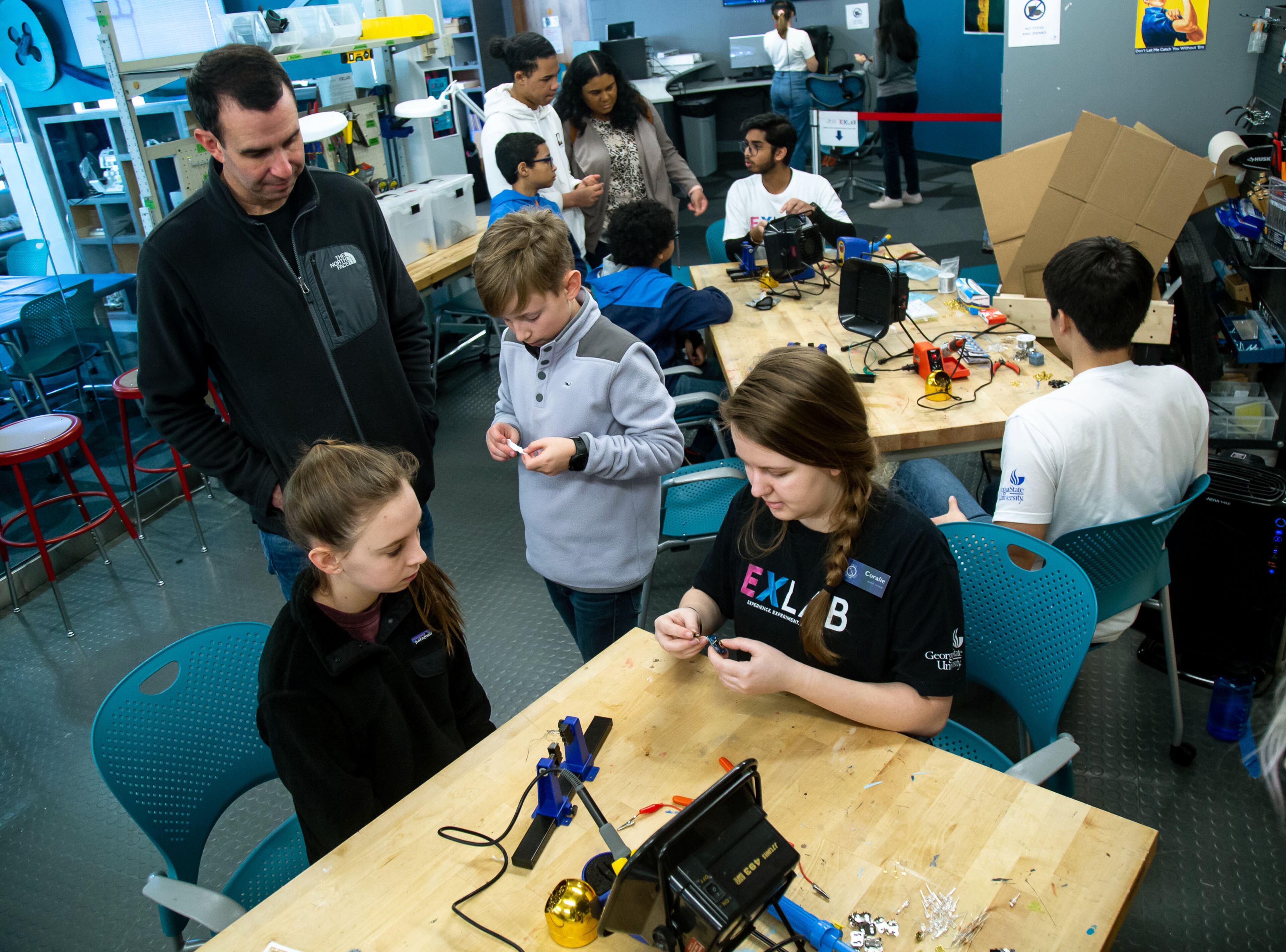 People work on electronic projects during the Genius Camp in the ExLab at Georgia State University on Saturday, March 7, 2020. STEVE SCHAEFER / SPECIAL TO THE AJC
