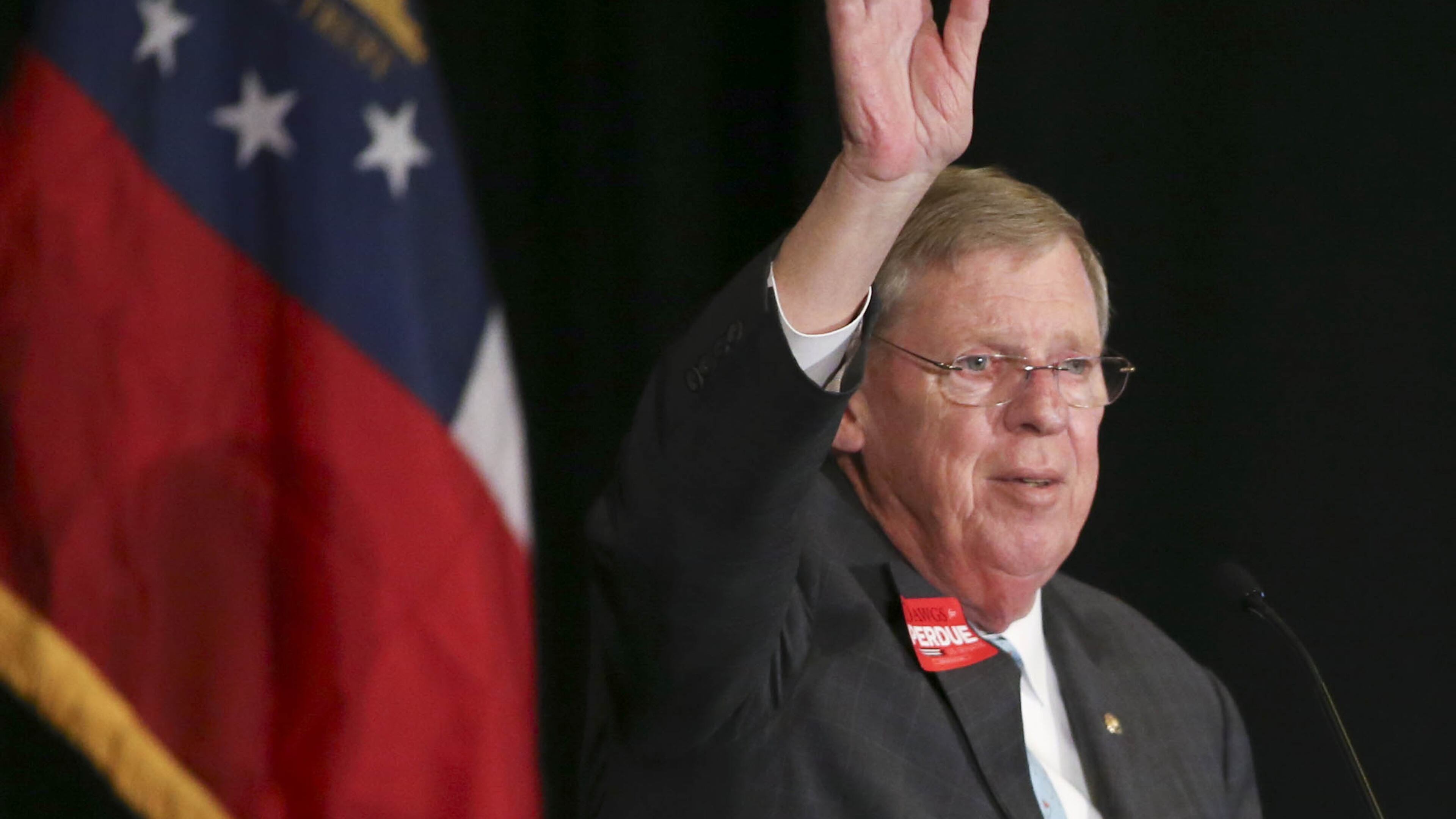 ATLANTA, GA - NOVEMBER 4: U.S. Sen. Johnny Isakson (R-GA) waves to the crowd after he spoke in support of Republican U.S. Senate candidate David Perdue at the InterContinental Buckhead November 4, 2014 in Atlanta, Georgia. Perdue is running in a tight race against Democratic U.S. Senate candidate Michelle Nunn. (Photo by Jason Getz/Getty Images) Johnny Isakson isn't waving goodbye. (Credit: Jason Getz/Getty Images)