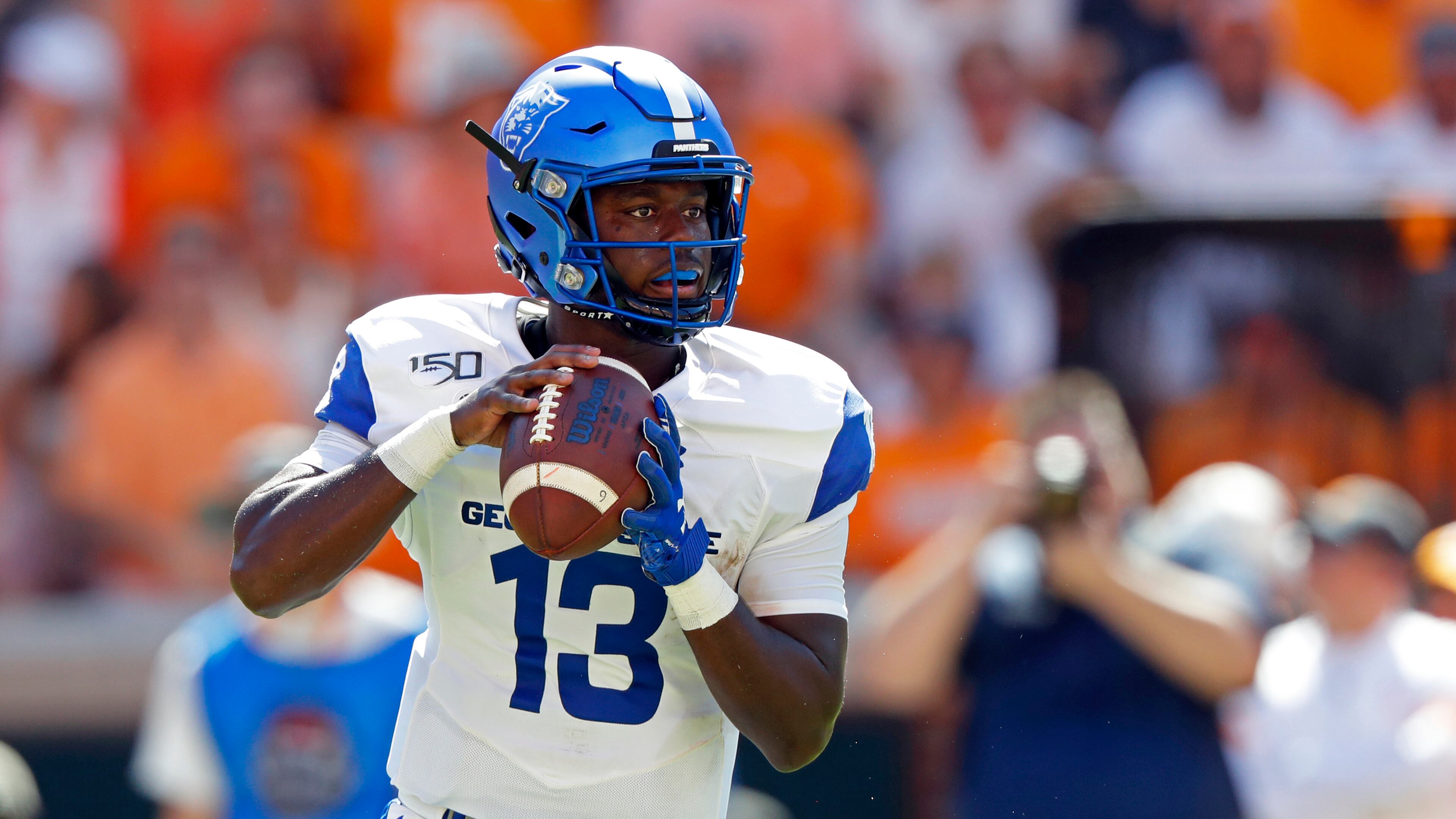 Georgia State quarterback Dan Ellington (13) looks for a receiver in the first half of an NCAA college football game against Tennessee, Saturday, Aug. 31, 2019, in Knoxville, Tenn. (AP Photo/Wade Payne)