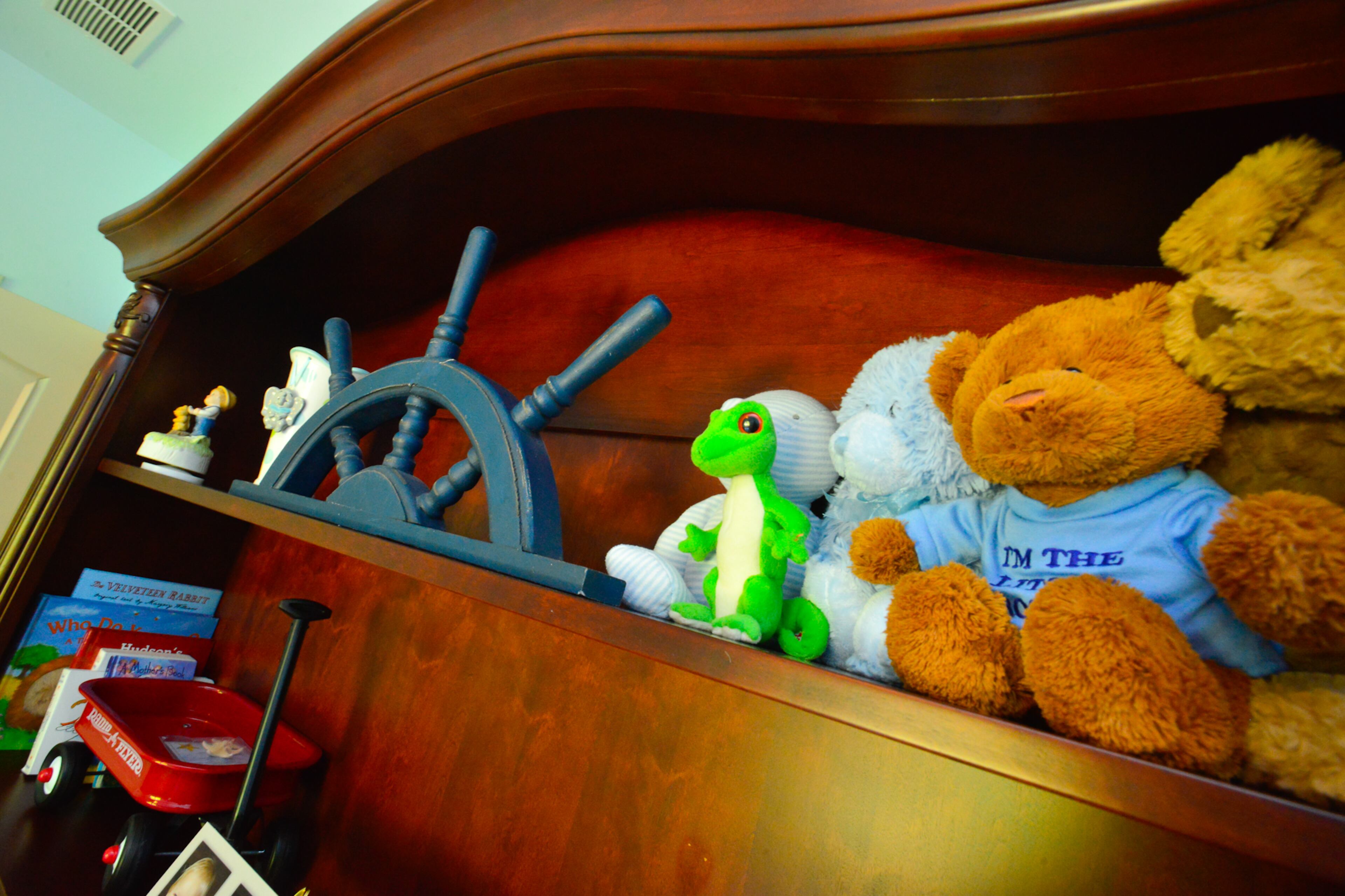 The baby's room has a sea creature theme, using Behr's Salty Tear for the paint.