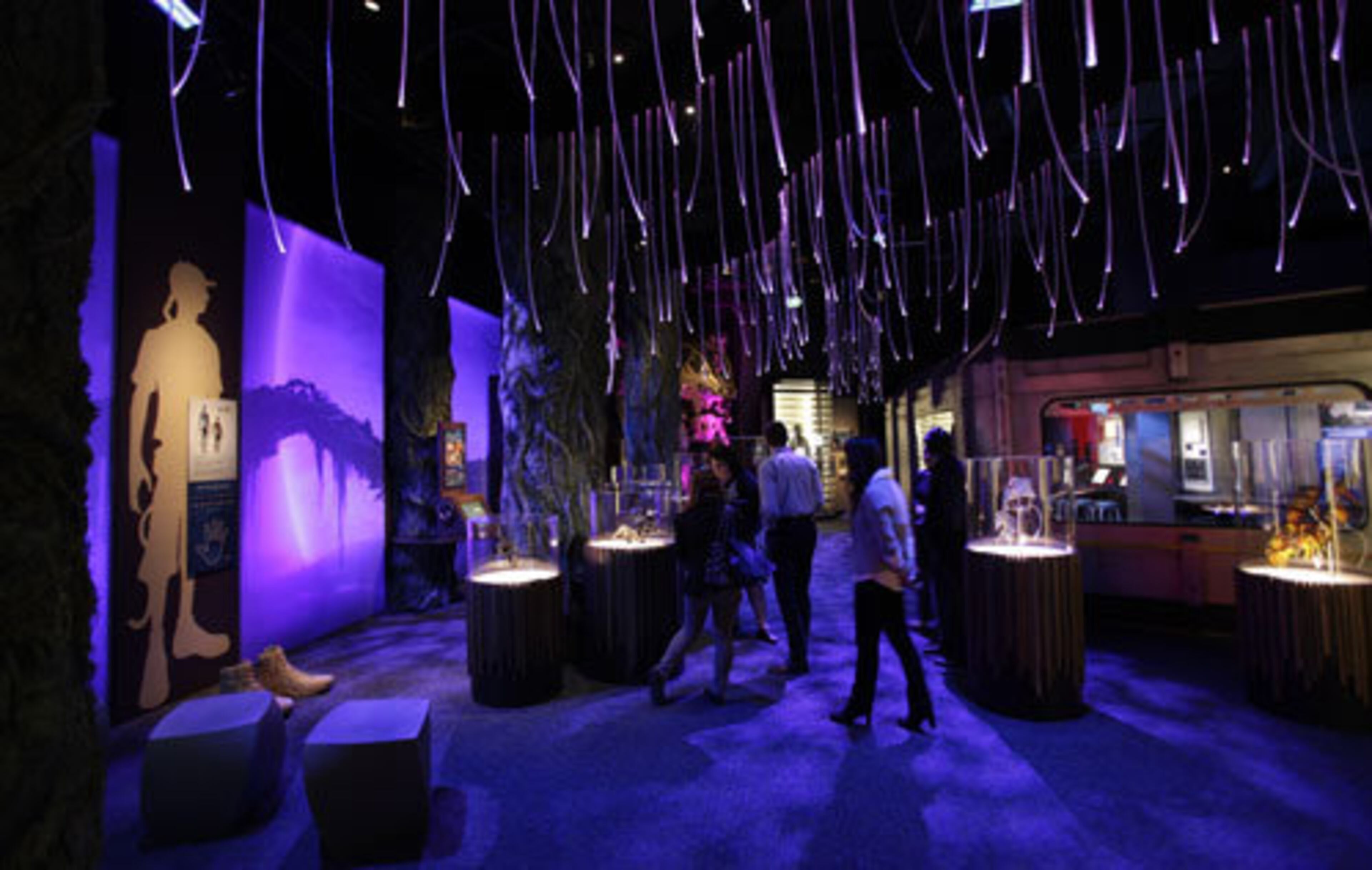 Visitors walk through the main room the "Avatar" exhibit.