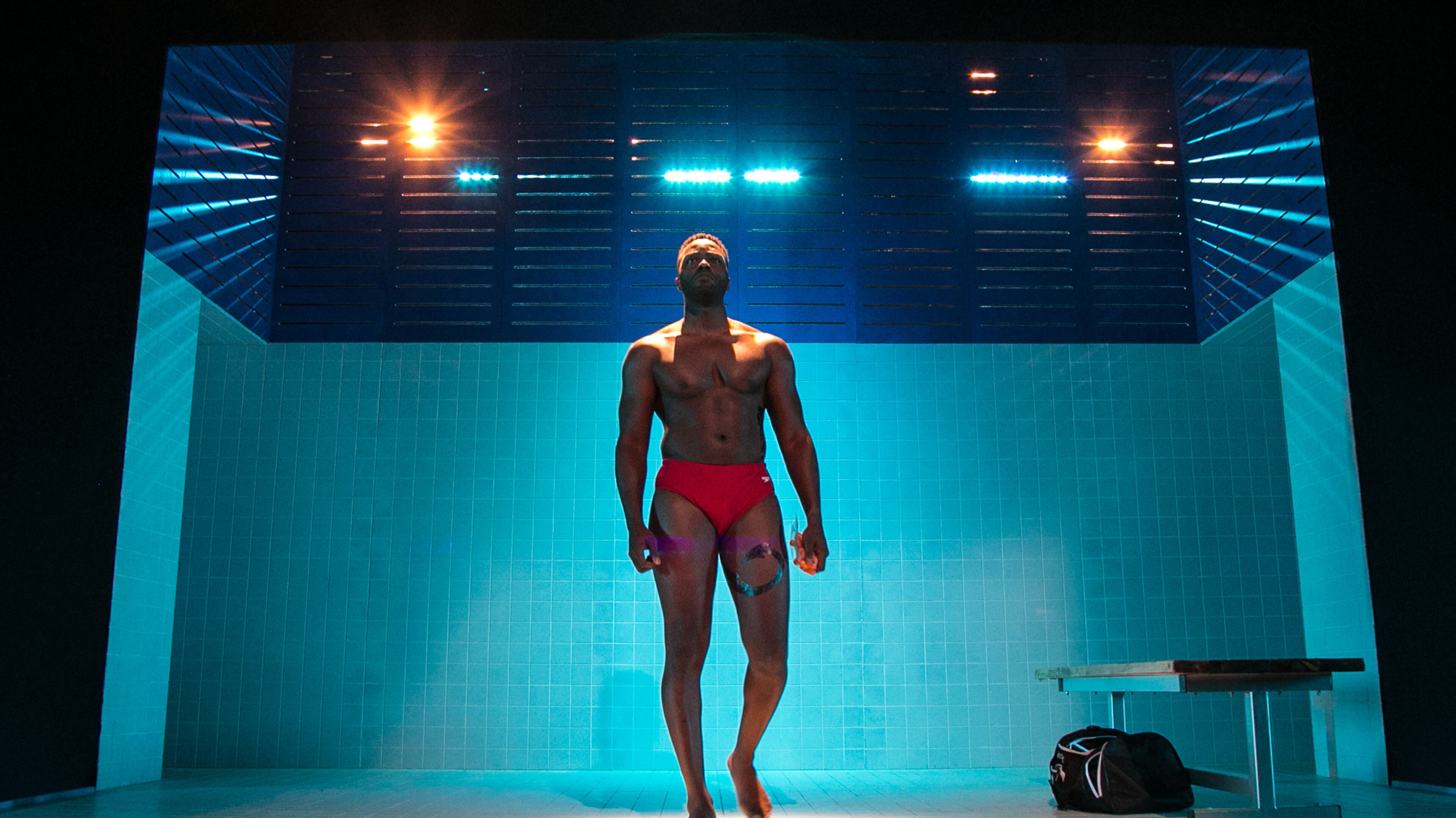 Actor's Express begins its 2021-2022 season with "Red Speedo," and with COVID-19 precautions that require cast, crew and members of the audience show proof of vaccinations, or a negative test for COVID-19. In this comedy/thriller, Marlon Andrew Burnley plays a champion swimmer caught in a drug-fueled plot. Photo: Casey Gardner Ford