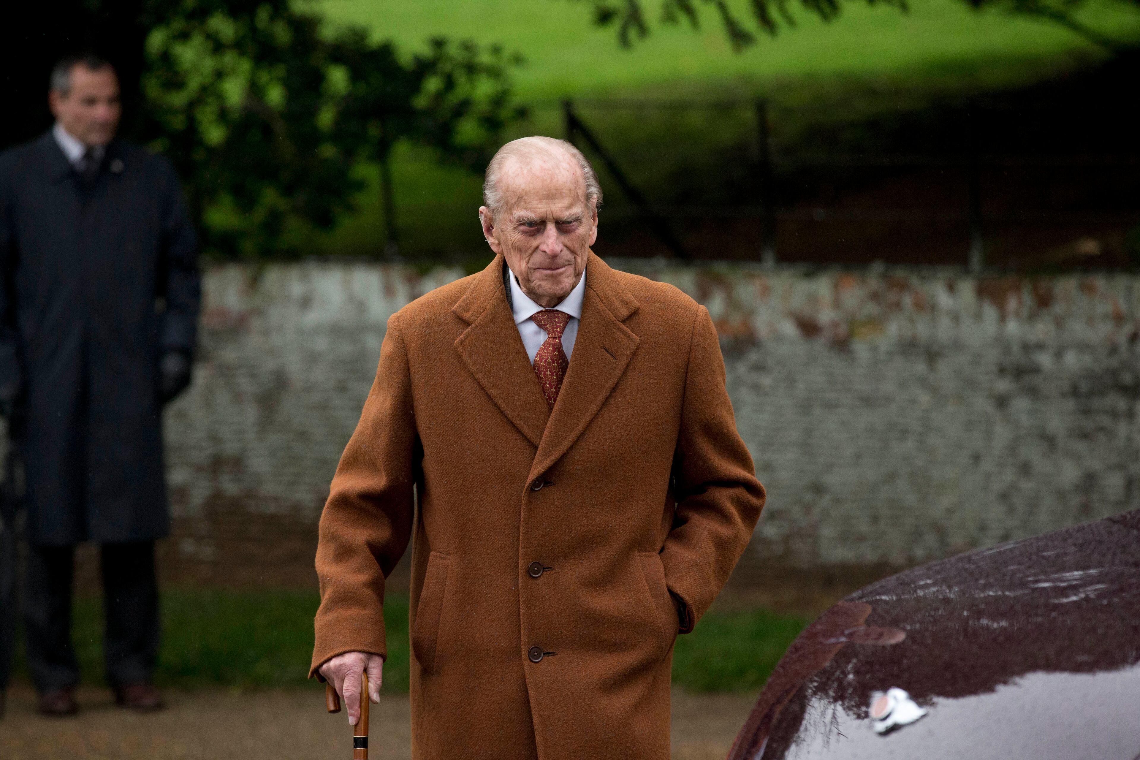 Britain's Prince Philip leaves after attending the British royal family's traditional Christmas Day church service at St. Mary Magdalene Church in Sandringham, England, Friday, Dec. 25, 2015. (AP Photo/Matt Dunham)