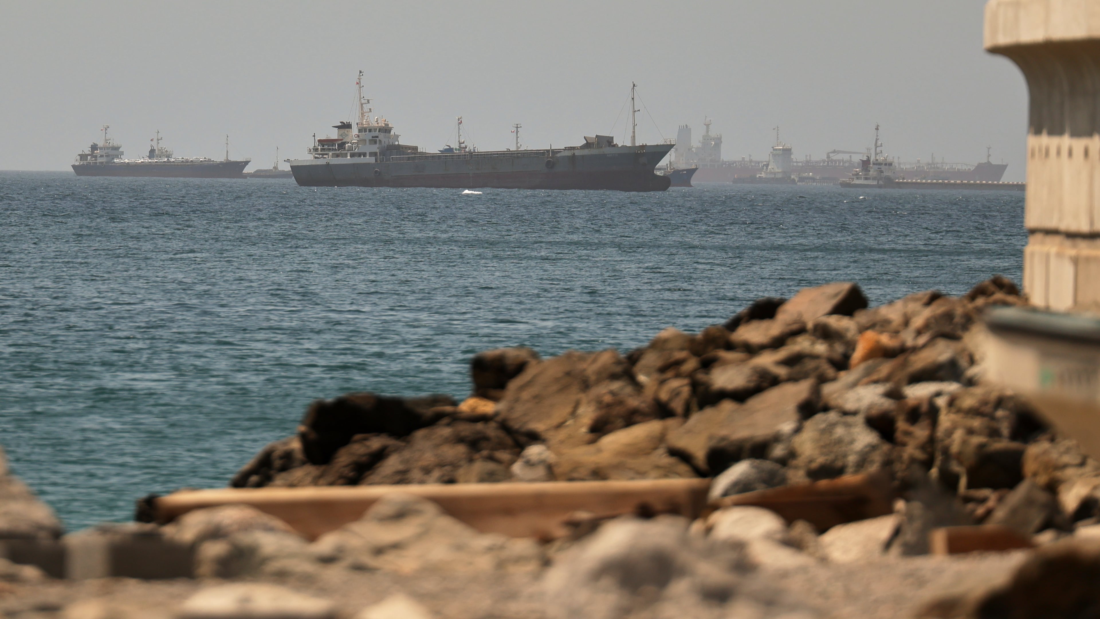 Tankers and cargo vessels are seen in the Gulf of Oman, along shipping routes linking the Strait of Hormuz and the Arabian Sea, Tuesday, June 16, 2026. (AP Photo)