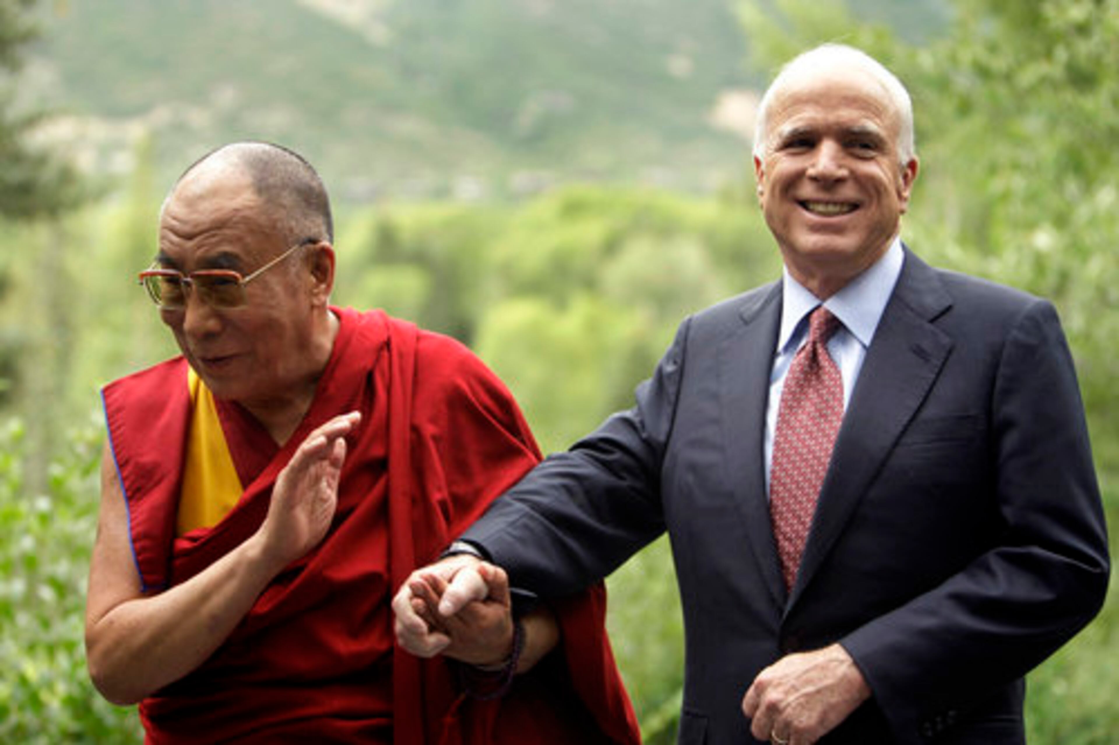 In July, McCain and the Dalai Lama greet each other in Aspen, Colo. Though jovial here, McCain has a reputation for having a quick temper.