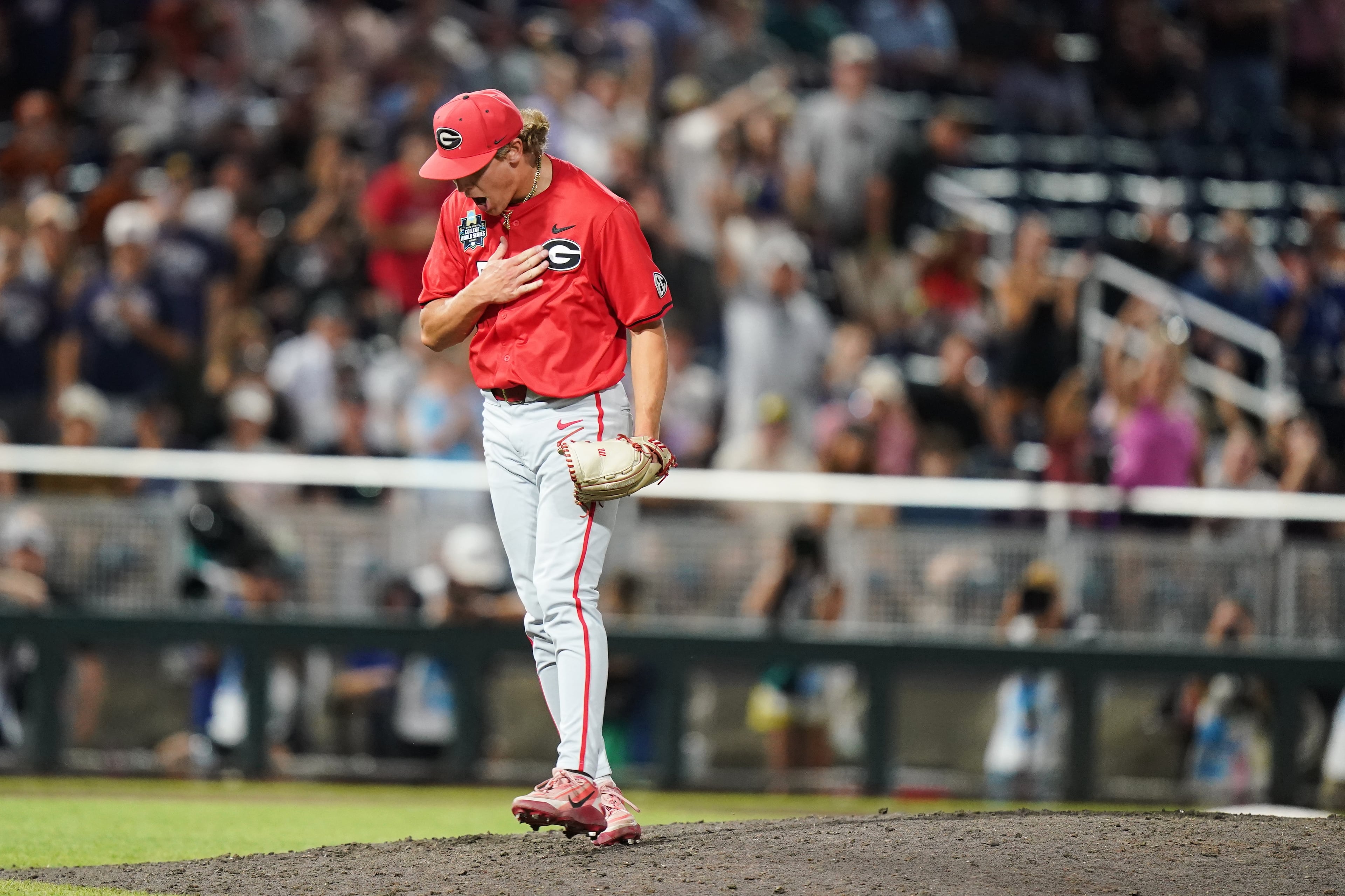Georgia pitcher Justin Byrd (5) reacts after an NCAA baseball College World Series elimination game against Texas, Tuesday, June 16, 2026 in Omaha, Neb. Georgia won 2-0. (AP Photo/Vera Nieuwenhuis)