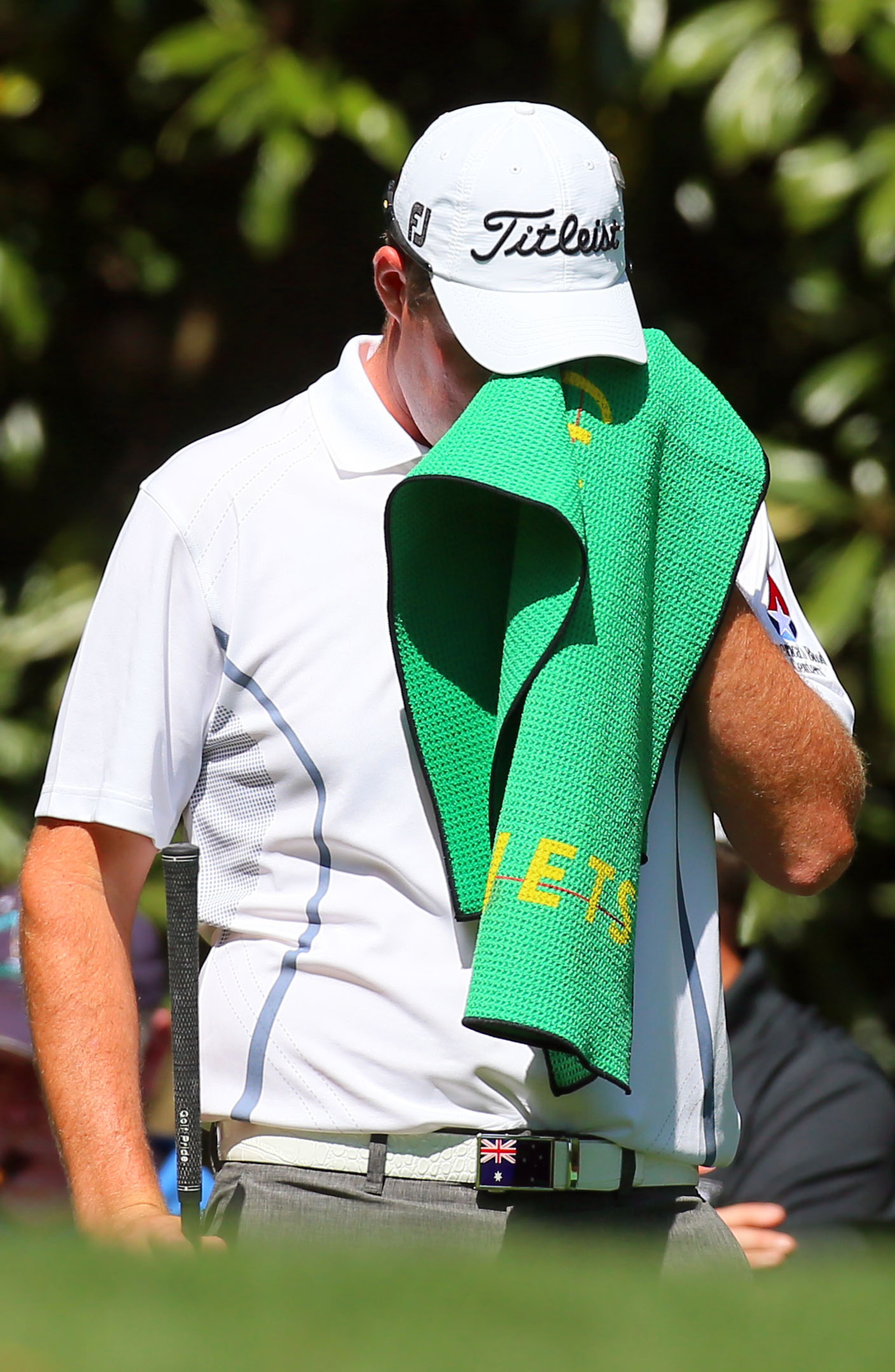 Marc Leishman wipes his face on #11 tee during the second round in the Masters Tournament on Friday April 12 2013. CURTIS COMPTON / CCOMPTON@AJC.COM
