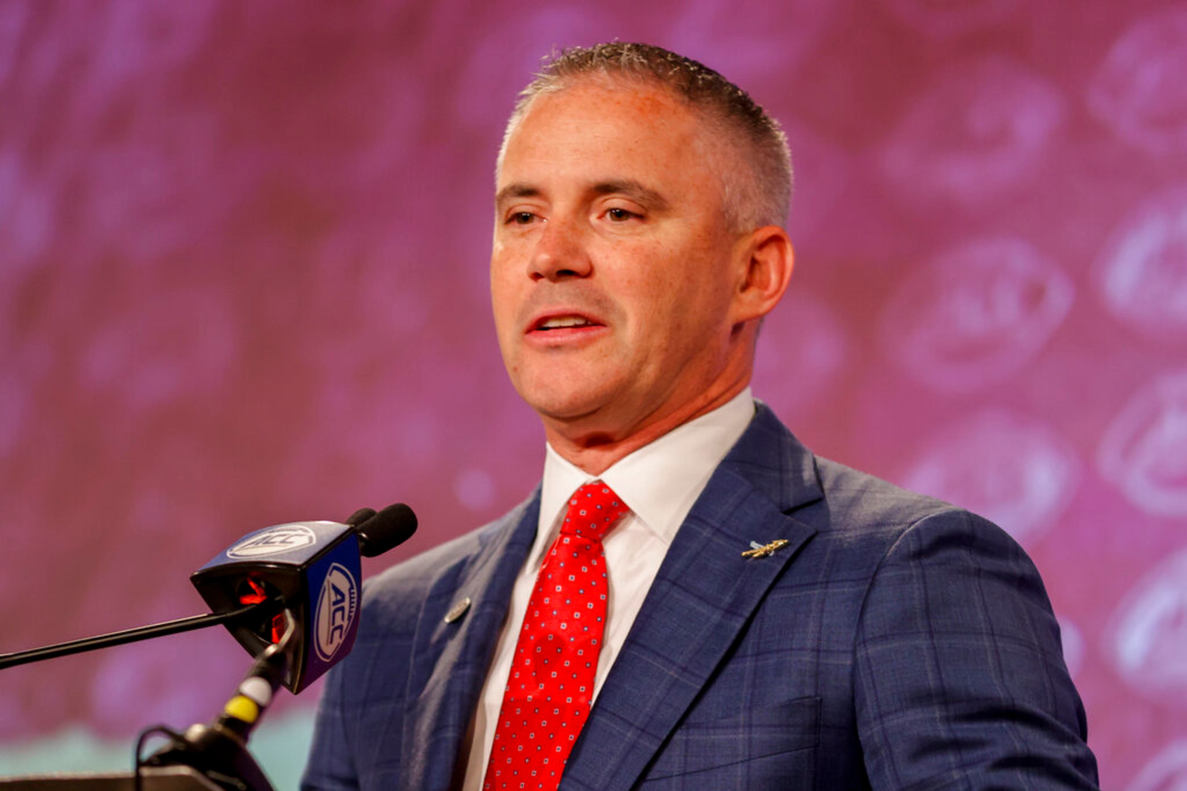 Florida State head coach Mike Norvell answers a question at the NCAA college football Atlantic Coast Conference Media Days in Charlotte, N.C., Wednesday, July 20, 2022. (AP Photo/Nell Redmond)