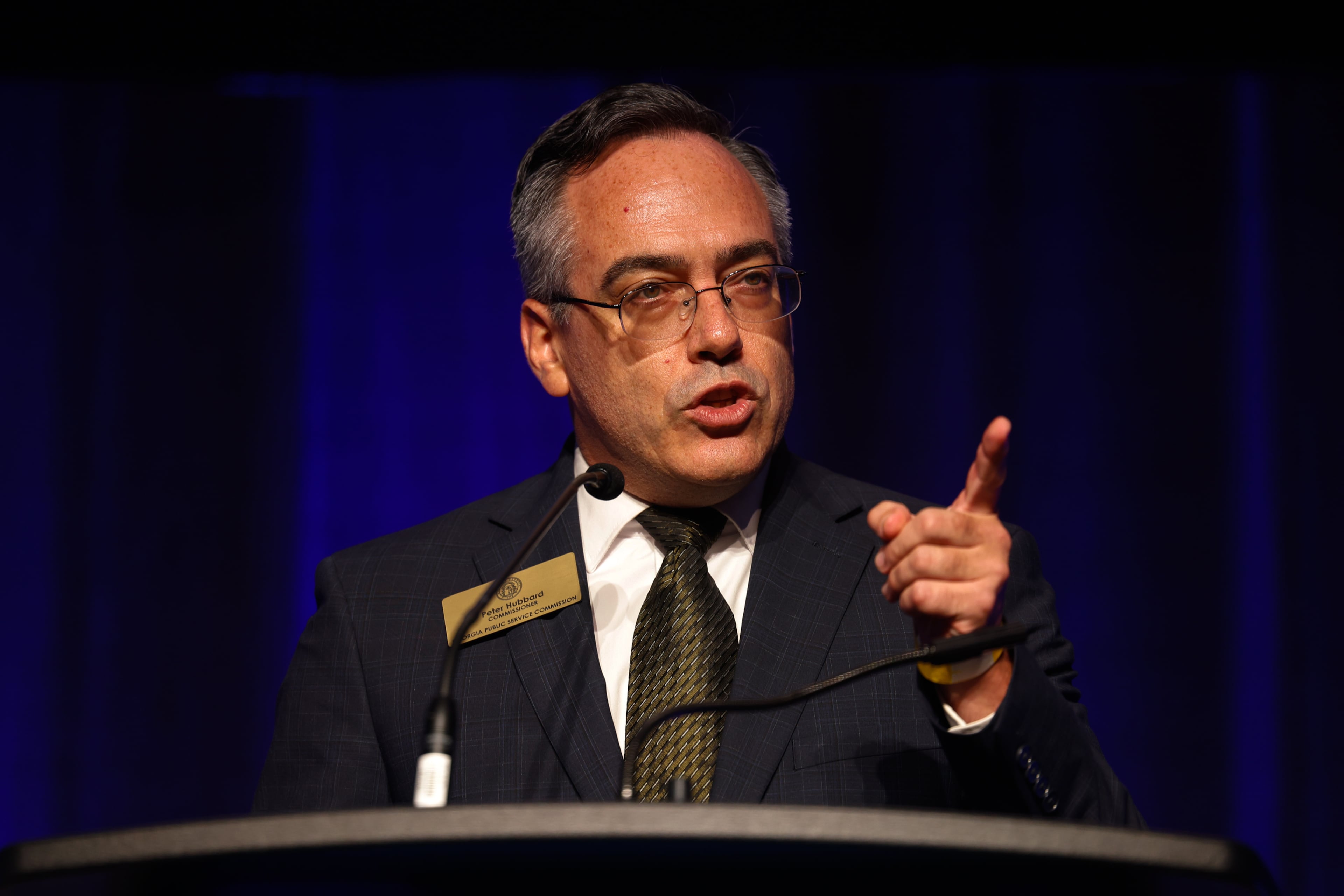 Georgia Public Service Commissioner Peter Hubbard speaks at the Democratic Party of Georgia's state convention at the Savannah Convention Center in Savannah on Aug. 1, 2026. (Arvin Temkar/AJC)
