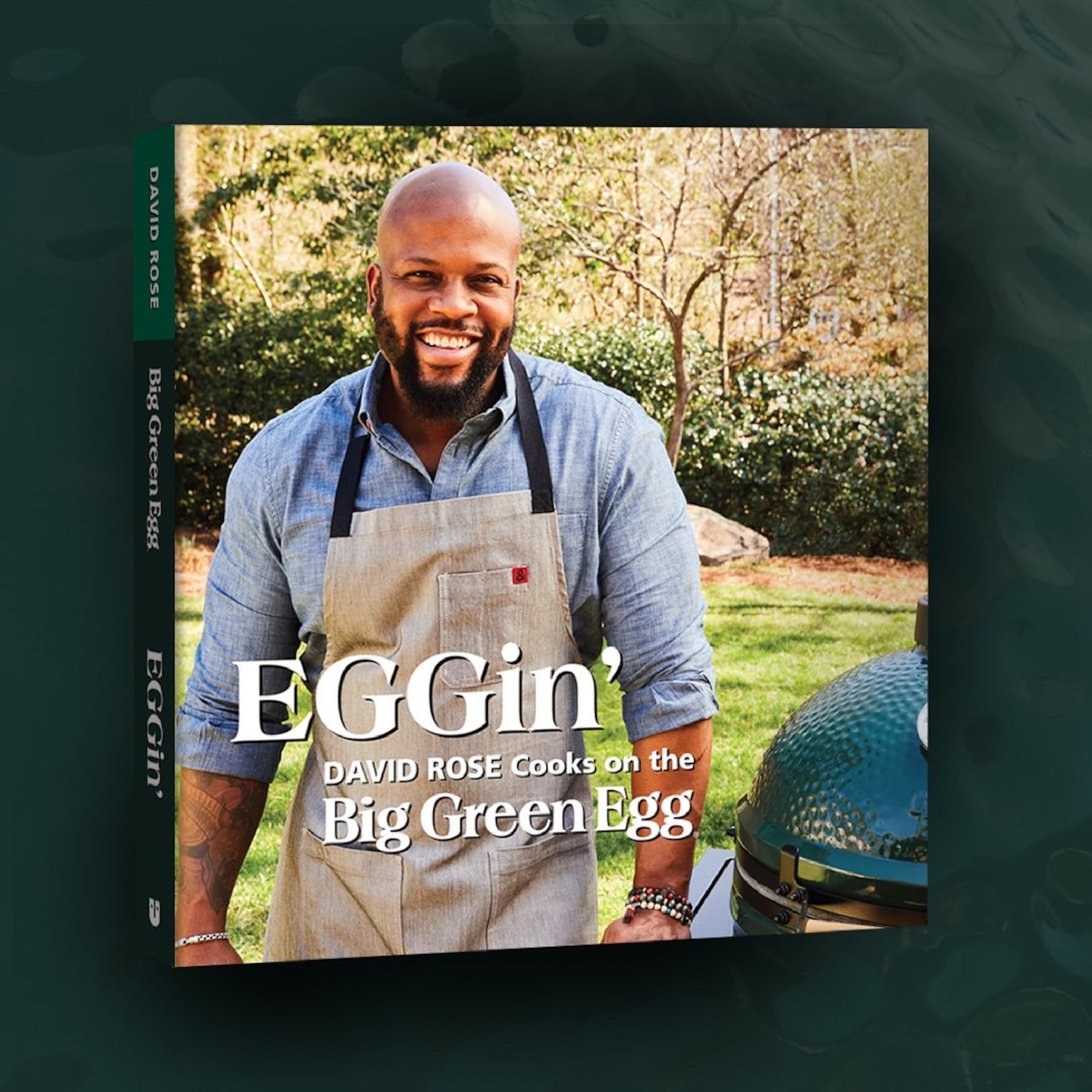 The cookbook “EGGin’: David Rose Cooks on the Big Green Egg” features more than 80 outdoor recipes blending the chef’s Jamaican heritage, French culinary training, and Southern inspiration. (Courtesy of Kathyrn McCrary)