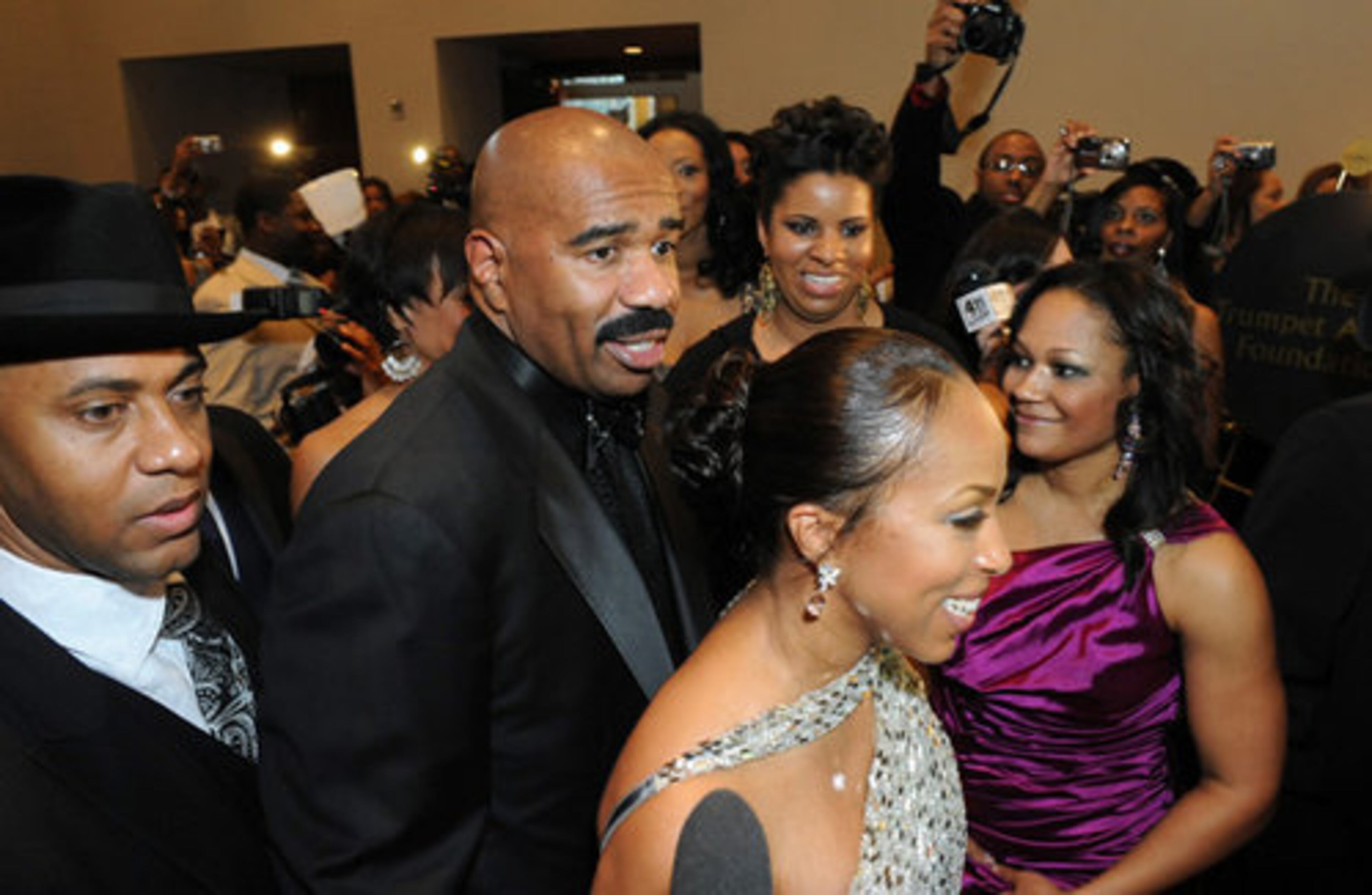 Steve Harvey, 2010 Trumpet Awards Honoree for Pinnacle Award, and his wife Marjorie Bridges Harvey arrive.