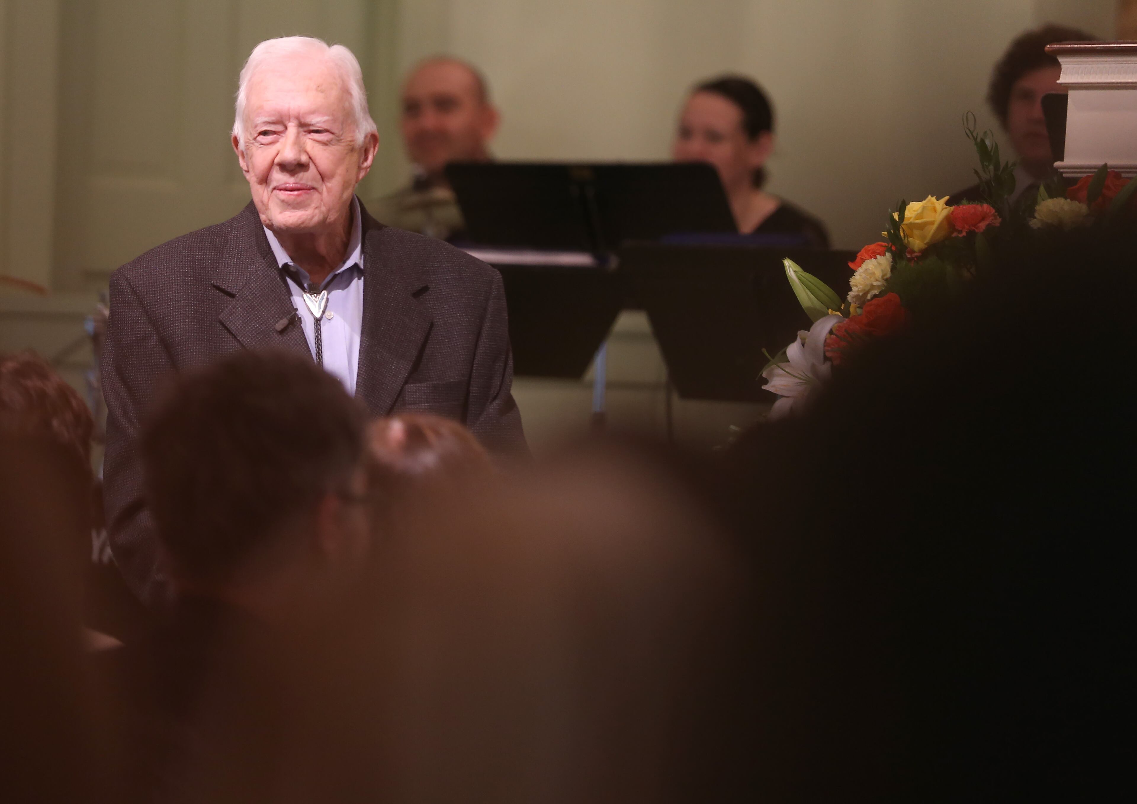 President Jimmy Carter talks to the overflow crowd at Maranatha Baptist Church in Plains on Sunday morning August 23, 2015 before teaching Sunday school. Ben Gray / bgray@ajc.com