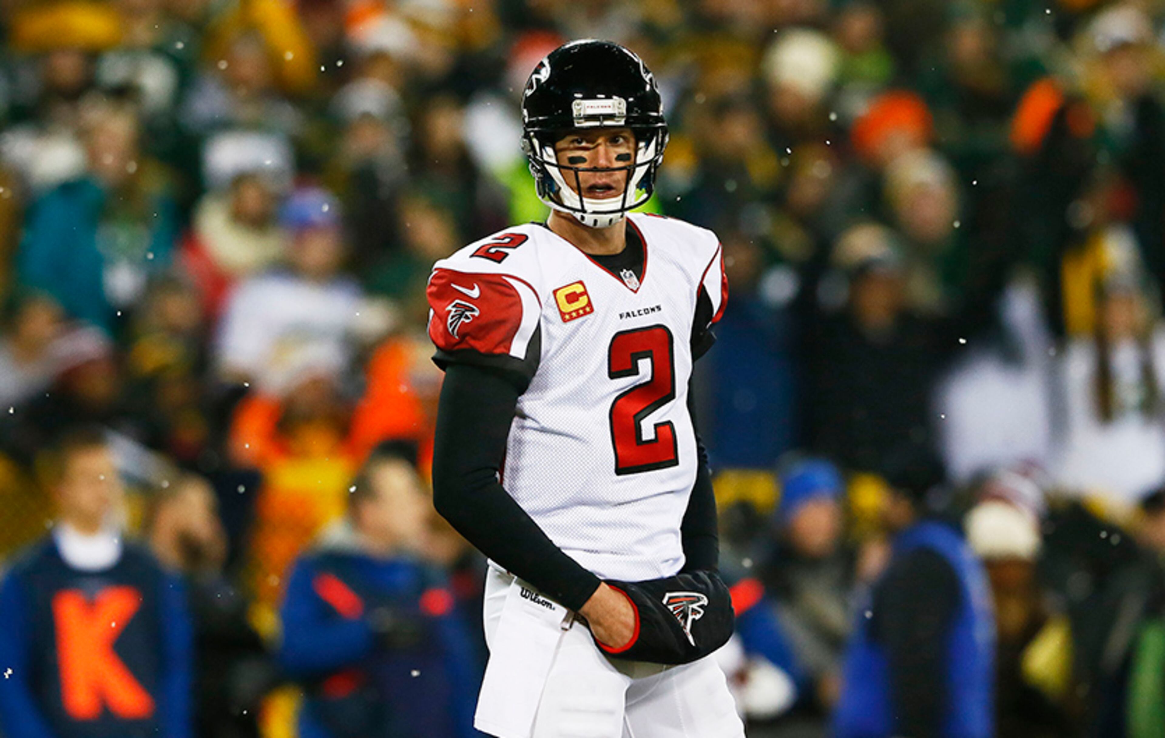 Falcons quarterback Matt Ryan threw for a touchdown and an interception in the first half against the Green Bay Packers at Lambeau Field on Dec. 8, 2014 in Green Bay, Wis.